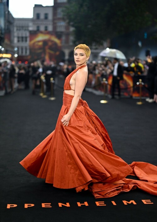 Florence Pugh | 'Oppenheimer' premiere, London, UK - July 13, 2023

'Oppenheimer' Cast Squeezes in London Premiere Red Carpet as Potential Actors Strike Looms

SAG-AFTRA is expected to announce their decision whether to go on strike Thursday afternoon

The cast of Oppenheimer hit the red carpet in London earlier than expected on Thursday, amid a potentially imminent actors' strike.

Cillian Murphy, Florence Pugh, Matt Damon, Emily Blunt, Robert Downey Jr. and more attended the U.K. premiere of Christopher Nolan's upcoming biopic at Odeon Luxe Leicester Square, hours before SAG-AFTRA makes a decision about whether to strike against the Alliance of Motion Picture and Television Producers (AMPTP).

Downey, 58, wore a gray suit, while Blunt, 40, Murphy, 47, and Damon, 52, opted for mostly black attire, with Blunt's dress featuring dramatic cutouts and a silvery pattern. The actress also accessorized in Lorraine Schwartz jewelry featuring Colombian emeralds and diamonds.

Pugh, 27, rocked a copper-orange gown — which matched the color scheme of the premiere’s backdrop featuring reddish smoke from an explosion — with a plunging ruched neckline and wide cutouts on the sides. Her shaved-head look also appeared to have grown out into a short blonde 'do.

Of the potential strike, Blunt told Deadline on the red carpet, "I hope everyone makes a fair deal and we are here to celebrate this movie. And if they call it, we’ll be leaving together as cast in unity with everyone … We will see what happens. Right now it’s the joy to be together."

Variety reported that the start time of the red carpet was pushed up an hour in the hopes of pulling off the event before any strike were to begin.

The film follows J. Robert Oppenheimer (played by Murphy), the scientist who famously led the Manhattan Project — the effort to create an atomic bomb during World War II.

Following the recent (and ongoing) Writers Guild of America (WGA) strike, which caused many TV and movie writers to leave the writers’ room and head to the picket lines, the Screen Actors Guild is pushing for a new contract with the AMPTP.

If they don’t reach a new agreement that meets their terms, many actors have already threatened to strike, which could delay countless movie and TV projects. This could be dire for the film industry as many projects have already paused production amid the writers’ strike.

SAG-AFTRA’s current contract with the studios was set to expire June 30, but was later extended until July 7, Deadline previously reported.

However, after a recent negotiation held on Wednesday failed to produce a new agreement, CNN reported, a SAG strike appears to be imminent.

SAG-AFTRA's president Fran Drescher and national executive director & chief negotiator Duncan Crabtree-Ireland said in an official letter addressed to members on Thursday morning that the group "called for a meeting with our National Board this morning to vote on a strike order."

Defining the AMPTP as "the entity that represents major studios and streamers, including Amazon, Apple, Disney, NBCUniversal, Netflix, Paramount, Sony, and Warner Bros Discovery," Drescher, 65, and Crabtree-Ireland alleged the group "remains unwilling to offer a fair deal on the key issues that you told us are important to you."

"Though we’ve engaged in negotiations in good faith and remained eager to reach a deal that sufficiently addressed performer concerns, the AMPTP’s responses to our proposals have not been adequate," they wrote in the letter.

Crabtree-Ireland and the Nanny alum promised to update members "immediately after the National Board’s vote," adding that "information will be provided on how the strike impacts your ability to work. Details on picket times and locations will be provided as well."

"Our 90-year history is a testament to what can be achieved through our conviction and unity. For the future of our profession, we stand together," they concluded.

On Tuesday, the union announced it had agreed to what it described as "the AMPTP’s last-minute request for federal mediation" with just hours to go before the deadline, though it alleged that the AMPTP had leaked its request for mediation to the press before it informed the union's leadership of that request.

"We will not be manipulated by this cynical ploy to engineer an extension when the companies have had more than enough time to make a fair deal," SAG said in a statement Tuesday.

SAG-AFTRA members previously voted 97.91% in favor of authorizing a strike on June 5 before it began negotiations with the AMPTP on June 7, though that vote did not immediately call for a strike.

“Together we lock elbows and in unity we build a new contract that honors our contributions in this remarkable industry, reflects the new digital and streaming business model and brings ALL our concerns for protections and benefits into the now!" Drescher said in a statement at the time.

People

#FlorencePugh