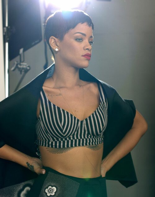 Rihanna | Elle UK 2013 Outtakes

Cover interview Rihanna gave ELLE exclusively for April 2013 issue

Behind The Cover: Rihanna

It’s 11pm in Paris. The cover shoot is over, the interview still to come. This wasn’t the schedule, but, as ever, we’re on Rihanna Time. I’m asked over to her hotel in Place Vendôme, where her director of international marketing is wondering if the bar downstairs might have the right sort of ‘vibe’. Ri and I can sit in the corner, she decides, the security guy keeping intruders at bay, and the rest of the entourage can have a drink nearby – which they do, apart from one who stays within earshot pretending to read emails and leaps up to deliver throat-cutting arm signals every time she hears the words ‘Chris’ or ‘Brown’.

Rihanna floats in at two in the morning and floats out just after three. As you’d imagine, she is charm personified – huge, huge liquid eyes and a west-coast accent with echoes of her Bajan background. A bottle of chilled Chablis shows up and we’re poured a big glass each.

To begin with, I ask her about music. And why not? Auditioned in Barbados, she signed a deal with Jay-Z’s Def Jam Recordings at the age of 16. Her first single, Pon de Replay, was a worldwide hit and she’s now made seven albums, Unapologetic the latest, and sold 200 million records in 74 different countries, assisted by 3.2 billion YouTube hits and over 65 million friends on Facebook. She has had 75 official Number Ones. It’s an astonishing trajectory on every level, and she only turned 25 this February. I’d be happy with just her Air Miles.

I’m fascinated by the way her songs come about, I tell her, as she doesn’t write them. She commissions them. Does she suggest subjects to her songwriters or do they compose them and hope they’ll get recorded?

‘I spend a lot of time with them so they know my story by the time they write, and it’s always the truth. At times I won’t be rebellious or edgy, sometimes it’ll be vulnerable and really innocent but you don’t know what bad things that girl might do to get to the vulnerable state! Sometimes bad girls are tired of bad s***,’ she says.

Songs like Pour it Up and Cheers (Drink to That)… are they warnings about the way men can behave?

‘Not necessarily warnings, it’s just the truth. I happen to think like a man, too, and do certain things guys like to do. I grew up around boys. There was just me and one female cousin in this group of family and friends, so I went to school and I automatically had guy friends and when I came to this industry all my friends happened to be guys. When I was a teenager I wasn’t [romantically] interested in guys at all ’cos I thought I was one of them! They didn’t seem exciting to me, they were more like a pain in my ass. Our conversations were like we were brothers, we would talk all the time. I go to strip clubs – sometimes with men, sometimes on my own. Why? ’Cos I enjoy the music they play there. It has a certain vibe and I watch the girls pole dancing. Even now I will go to, like, an industry event and all the ladies will be over here and all the guys over here and I will go to the guys’ table and sit because I just feel I can have a much better conversation over there. And that’s automatic, it’s not prejudice.’

I tell her I admire her for saying that: it’s not what her record label would want her to say.

‘I said that one time and LA Reid [who signed her to Def Jam] said, “You have to say you’re a girls’ girl because girls are your fans!” He was mad at me,’ she shrugs. ‘But it’s the truth. I’m a tomboy. My best friend Melissa [Forde], she was the one who girled me up. I would go to clubs with her and she’d be dressed up and I’d be wearing, like, sneakers and a bandana and I didn’t find anything wrong with it until she started showing me magazines. And we’d just sort of stare at them, these craaazy fashion stories and these craaazy sex stories! I learned a lot hanging out with Melissa.’

Rihanna’s interest in fashion has grown to the extent that she launches her first collection, with British high-street label River Island, this month.

‘She came to us,’ River Island’s marketing director Josie Roscop tells me, in Paris for the shoot. ‘She loved the fact we were a family-owned British business. Every item in the range has her contribution. We’re not just pulling pieces out of her wardrobe and copying that line. We helped to realise her vision, a nice mix of femininity and a tomboy twist, very chic but with an edge to it.’

‘I love the high-street shops,’ Rihanna tells me when I ask her about the project. ‘The stylish kids on the street, they’re the ones that set the trends. The designers see what they’re doing and go and design their line and sell it back to the same kids and it’s like, why not go directly to the source? High-street shops pay more attention to the kids on the street than to the runways, so in a way I like to mix both. I love a high-end bag or jacket with a simple dress.

I just thought, I’m going to make something for everybody – every personality, every body type.’

Today, I saw for myself what Rihanna-style means. The shoot took place in Montparnasse. The effervescent photographer Mariano Vivanco and crew were at the studio at ten, the talent due at eleven. He set up his cameras and papered the walls with references, shots of Edie Sedgwick, Marilyn Monroe, Bettie Page, Brigitte Nielsen, Twiggy and Linda Evangelista. There were 10 set-ups planned, among them the cover, and various pieces from the River Island collaboration. A tented make-up and hair salon had been erected on the terrace outside, and a changing-room stocked with a range of exotic drinks.

She arrived – and only three hours late!

And out of hair and make-up Rihanna eventually came, even taller than her 5ft 8in on her perilous heels, which immediately tore two gashes in the backdrop and sparked a fit of hand-on-mouth giggles. I watched from 10ft away, fascinated by the ease of her movements, her luminous skin and the shower of blue stars tattooed down her neck and back. A thin gold chain hung across her navel; there’s another, I’m told, between the rings on her nipples. She made sinuous little moves to the music – Gotye, Bowie, Pet Shop Boys, Pointer Sisters – softly mouthing the words ‘You be the match, I will be your fuse,’ to Miguel’s Sure Thing. She draped a long arm around the shoulders of anyone who wanted a picture with her.

This was not my first encounter with the hurricane-level impact of Rihanna. Back in November, around 1,000 people – including me – were packed into a tropically hot dancehall near Checkpoint Charlie in Berlin. Seven camera crews were trained on the stage; a DJ was playing thunderous tunes. They’d all arrived at eight in the evening and it was now well past eleven o’clock.

I had a magical ‘all-areas’ pass so I wandered through security and down into a maze of corridors that led to an underground bunker containing six band members and their technicians, the choreographers, a creative director, the ‘Glam Squad’ (costume designers, hair and make-up), a chef, a masseuse, the management and a host of tour and record-company personnel. At the far end was a room that looked nothing like the rest of this concrete rave palace. It had fur rugs, black curtains, soft furniture and ‘accents of pink’ – pink scented candles, pink lilies, embroidered lengths of pink Chinese silk – specially customised by the hospitality liaison manager to create ‘a comfortable environment’ for the star of the show.

There was an air of expectancy, a sense of calm before the storm. All of us – the band, the entourage, the audience upstairs – were doing the same thing. We were waiting for Rihanna.

We’d spent a lot of that week waiting for Rihanna.

I was on her now-legendary seven-day 777 tour. She had played five shows in five different countries – Mexico, Canada, Sweden, France and now Germany, with England and the States to come – and she’d been late onstage every night. Mention her time-keeping to any member of Team Rihanna and they’d roll their eyes fondly and tell you tales that made your hair curl: long hold-ups in huge arenas, or the time she made it to the wings just seconds before cruising onstage to sing on a live prime-time US TV show.

Crew members called her plane ‘Air Force One’, the name for the presidential jet, and the girl herself gave the glorious impression that life was just one big party with herself at the centre of it. ‘This is my rock’n’roll fantasy and it’s sure to be a wild ride,’ she’d announced before we took off and, bang on message, she’d grabbed the intercom between LA and Mexico City and shouted, ‘This is an emergency! Welcome to 777! Make some noise and let’s get drunk!’ Minutes later an air hostess was distributing glasses, Rihanna right behind her tipping out gold bottles of Ace of Spades champagne. ‘And if you really want to black out,’ her PA shouted, ‘we’ve got Cognac!’

This is the most over-the-top, all-hours event I’ve ever witnessed. I’ve travelled round America in U2’s private jet, but it was the very model of calm and efficiency. I was on a Rod Stewart tour, but that seems cut-price in comparison. I spent a week in Italy with hard-living Frankie Goes to Hollywood but at least we got some sleep at nights. But the Rihanna tour… I haven’t had so much fun for years.

When she eventually rolled up backstage in Berlin, everything clicked into the quietly controlled overdrive that indicates the queen has arrived at the hive. She was shepherded to her ‘Rihanna-ised’ dressing-room compound and the sweet scent of marijuana drifted over the curtains. Then she emerged to join the nightly ritual known as ‘The Prayer’, the signal that she’s finally ready to perform. The band locked arms in a huddle and the chant began, led by teetotal, God-fearing bassist Adam Blackstone (Ri’s musical director): ‘Dear Lord, bless this band, bless every beat of its drum, every note it sings. Bless every instrument and the sound it makes. We love you, God. Seven-Seven-Seven! BERRRLIIIIIIN!!’

When Rihanna (finally) arrives anywhere you get the same strange mix of emotions: a sense of relief that whatever was waiting to start can begin, and an overwhelming sensation – terrible but true – that you want to forgive her for everything because she’s just so fantastically pretty. There’s a loud, collective sigh all around you – men, women, teenage kids. She’s so beautiful it’s overpowering, the sort of mesmerising looks that can melt a room simply by entering it. Her huge lips and feline hazel eyes radiate a frailty and innocence known only to the impossibly cute heroines of Disney cartoons. But the rolling rhythm of her walk, the occasional narrow glance and the handgun tattooed below her right shoulder send off a whole different set of signals. It’s the same with the way she dances – one minute it’s little tottering high-heeled steps, sexy and vulnerable; next it’s the lascivious self-stroking moves of a high-class hooker.

How incredible to be that good-looking. To be able to raise the sum of human happiness just by turning up. How wonderful that would feel. Wonderful – and maybe slightly corrupting.

What do you think you represent for women? ‘I think women want freedom, they want to be empowered, they want hope, they want love, they want all the things that I want and I’m not afraid to say those things and act on them, and I think that’s why they identify with me. Women want to be fearless and sometimes all it takes is to see that it’s possible. Once you see it can be done, you think “I could do it, too.” That’s all I could ever hope for, to have a positive effect on women. ’Cos women are powerful, powerful beings. But they’re also the most doubtful beings. They’ll never know – we’ll never know – how powerful we are.’

Why not?

‘I don’t know. I don’t know if it’s the way society has trained us…’ she says, trailing off. ‘Women never know their full worth. Or sometimes they’re in denial about it. Or sometimes they’re afraid to have the right to it. That’s just a thing about us. But I find that men know their worth and their limits and they stick to that, it’s very simple.’

But you’ve had a lot of inspirational women in your life.

‘I’ve had incredible women – my mum, my grandmum, my best friends! I’ve got this Isis tattoo [on her ribcage] to symbolise my grandmother. Isis was an Egyptian goddess who taught women to be complete women – how to cook, how to clean, how to wash clothes, how to survive and not be slaves to men. She taught them to be independent women and to make things happen by themselves. And that’s the attitude of all the women in my family, and my grandmother was the one who first really taught me that. My mum, though, was exposed to certain things in life and that made her a little harder and maybe a little colder than other women. And I’m very much like her.’

This is the break-up with your father, right?

‘Yes. He wasn’t the best husband in the world but he was an amazing father. And that’s what he is to me, not my husband but my father. It was a relief when he was gone but I guess I loved him.’

Did their bitter divorce change the way you thought about relationships with men?

‘Well my mum never had to tell me anything. I figured it out by watching and sensing. Children know. People think children are stupid. Kids are not stupid. If my parents were angry with each other I could feel the energy in the room, whether they were arguing or not. It’s painful to watch your mum go through certain things. I learned a lot, you know.’

You might know this part of the story already. The middle-class Lady Gaga may have brought misfortune upon herself, but Robyn Rihanna Fenty was born into it. When she was 16, her mother divorced her crack-addicted father and had to work round the clock to support the family, leaving Ri to look after her younger brother, Rajad; ‘Probably the best summer I ever had,’ she tells me with touching maternal pride. ‘He’s growing so fast now,’ and she shakes her head. ‘Heeey, slow doooooown!’

She was obsessed with Madonna – ‘I loved the way she reinvented herself, like an actress always playing a different role’ – and was ‘sucked in by the tone and angelic sound’ of Whitney Houston. She also idolised the local hero Bob Marley and began singing pop and reggae (her single Man Down is pure Jamaican dancehall).

But in February 2009, an event occurred that was – in the light of her hard-living bravado, her apparent confidence, and first-hand experience – hard to understand, and impossible to overlook. When a Los Angeles Police Department photograph was leaked to the TMZ website, the world was horrified to discover that she’d been badly beaten up. The R&B artist Chris Brown, her boyfriend, was charged with assault and placed under a restraining order that forbade him to be within 50 yards of her, reduced – in a bizarre legal twist – to 10 yards if the two of them had to appear at the same industry awards.

The bleak mystery of this miserable tale still casts a long shadow. The girl who could have everything – a symbol of strength, independence and opportunity – appeared to be in the worst relationship imaginable. With the nearby minder leaping in repeatedly to say the interview’s ending if the subject doesn’t change, it takes four attempts and a fair amount of subterfuge to piece together the conversation that follows. Twice, curiously, she moves back to the topic herself, talking in an intense low whisper, clearly wanting to make a point. The song Stay on the new album must be about Chris Brown, I suggest.

‘Stay is a story about having love that close and wanting it to last forever. You don’t have that feeling with everybody so when you have it you don’t want to let go of it. I would definitely say that he is the one I have that kind of relationship with.’

You must want us to know that relationship is back on as you keep tweeting pictures of you both lying on beds.

‘Well I Instagram everything about my life, whether it’s smoking pot, in a strip club, reading a Bible verse – how crazy, I know! – or hanging out with my best friend, who happens to be Chris. And right now that’s just what we want, a great friendship that’s unbreakable. Now that we’re adults we can do this right. We got a fresh start and I’m thankful for that.’

It must be strange having the whole world telling you how to run your life.

‘I know, but I got used to it. And I understand it. Everybody has an opinion about everything. But an opinion is just an opinion – I can only respect it but I can’t do anything to change their minds or to change the way I feel. Nothing is going to change because of their opinion. Everybody wanted to know what was happening in my life. Is she a drug addict? No. Is she an alcoholic? No. Is she a victim? No. That’s when I got the gun,’ she points to her handgun tattoo. ‘It was a symbol of strength – it was “I’ll never be a victim!” I had all these eyes on me, critic after critic after critic! I’d heard so many things I was kind of numb to it. When I had my breaking point – my turning point, sorry – I got enough s*** where I had to make a decision. I was like, who am I trying to please? None of these motherf***ers know me! Why do I care about what they think? I started thinking, what if I went my whole life trying to please everybody? You will never please everybody. And you haven’t pleased yourself ’cos you’ve been so busy trying to please everybody and then it’s too late. I had to have that breakthrough, to tap into who I really was. And the truth. And trusting myself again.’

So you thought you were deceiving people?

‘Yeah. I think I came to a point where I started lying to myself. And it’s so hard to live a lie,’ she shakes her head. ‘It’s just too hard. It’s too difficult. It’s too much to think about. That’s why I’m posting pictures of myself smoking pot, to tell the truth about myself. I’ve got so much to think about, why bring all this extra s*** by being dishonest? When somebody else lies to you, you don’t trust them. Trying lying to yourself, that’s even worse. You can’t paint a fake picture for too long before the truth comes out and then it’s hard that it doesn’t match up.’

So your new policy is all about honesty?

‘It’s all about honesty. This is not failure, it’s lessons. It’s not the end. If you learn from mistakes it’s not failure. If you go and do the exact same f***ing thing then that’s the stupidest thing ever and it probably won’t work the second time.’

But that violence of 2009 still seems unacceptable to an outsider. Your father had an abusive relationship with your mother – did that make you more accepting of Chris Brown’s behaviour than others might have been?

‘No, I didn’t “accept” anything! I’m not accepting anything that’s wrong! What’s wrong is wrong, no matter who it’s coming from and that’s just that.’

But you’ve obviously forgiven him.

‘Yeah.’

Why?

‘I have my own reasons, very very private reasons. Very personal.’ She’s speaking very quietly. ‘A lot of things. Bottom line – I know him. I had a lot to think about and I had a lot of time to think about it. I was trying to do this for myself. I did not notice how many women were going through the same thing as I was. I didn’t notice how many women were in a limbo of love, a dilemma. And with every aspect there was a different crowd of women who identified with different things.’

Everyone in your entourage seems slightly afraid of you and it’s probably been that way since you first had hits aged 16. Does that make it attractive to meet someone like Chris, someone you might be slightly afraid of yourself?

‘Ooh, you don’t know my mother!’ she laughs loudly, cleverly switching tack. ‘She’s the scariest person I know. I’m not afraid of any person in this world but her. I’m terrified of her! She called me two days ago and reeled me in about two naked pictures Melissa put up on Instagram – a sneak-peek from a photo book she’s making about me. My mom, she went crazy on me. I was like embarrassed. I felt like I got my ass whupped in front of my class in school!’

What did she say?

‘She said, “This was like a private moment and you’re just parading this around.” Mummy, first of all this is a book and… “You’re just excluding all your younger fans!” Mummy, then they’re not fans. You’re either a fan or you’re not. I’m not excluding anybody, you have to be yourself. She was yelling at me. She humbled the f*** out of me!’

Frantic gesticulations from the next table insist there’s time for only one more question. So I go for this and it’s strangely revealing: Rihanna, where would you like to be in five years’ time?

‘Shall I say this?’ She glances at her minders and leans in. ‘I will probably have a kid,’ she says, softly. ‘And I’m praying I can go on vacation for a good month. And I’ll have set up some things so I don’t have to tour for the rest of my life, even though I love touring. I want health and happiness in five years. I want to be healthy and happy.’

And who’ll be the father of this child?

‘Now who the hell would that be!’ she shouts theatrically to anyone still left in the bar, then gives me a smile that seems to me to be unambiguous. It’s the man we’ve just been talking about.

She affects an air of mystery. ‘I can’t tell you that,’ she says. ‘It’s not my business. It’s God’s business!’

ELLE #Rihanna