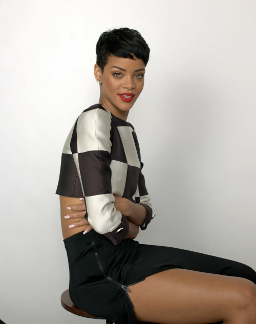 Rihanna | Elle UK 2013 Outtakes

Cover interview Rihanna gave ELLE exclusively for April 2013 issue

Behind The Cover: Rihanna

It’s 11pm in Paris. The cover shoot is over, the interview still to come. This wasn’t the schedule, but, as ever, we’re on Rihanna Time. I’m asked over to her hotel in Place Vendôme, where her director of international marketing is wondering if the bar downstairs might have the right sort of ‘vibe’. Ri and I can sit in the corner, she decides, the security guy keeping intruders at bay, and the rest of the entourage can have a drink nearby – which they do, apart from one who stays within earshot pretending to read emails and leaps up to deliver throat-cutting arm signals every time she hears the words ‘Chris’ or ‘Brown’.

Rihanna floats in at two in the morning and floats out just after three. As you’d imagine, she is charm personified – huge, huge liquid eyes and a west-coast accent with echoes of her Bajan background. A bottle of chilled Chablis shows up and we’re poured a big glass each.

To begin with, I ask her about music. And why not? Auditioned in Barbados, she signed a deal with Jay-Z’s Def Jam Recordings at the age of 16. Her first single, Pon de Replay, was a worldwide hit and she’s now made seven albums, Unapologetic the latest, and sold 200 million records in 74 different countries, assisted by 3.2 billion YouTube hits and over 65 million friends on Facebook. She has had 75 official Number Ones. It’s an astonishing trajectory on every level, and she only turned 25 this February. I’d be happy with just her Air Miles.

I’m fascinated by the way her songs come about, I tell her, as she doesn’t write them. She commissions them. Does she suggest subjects to her songwriters or do they compose them and hope they’ll get recorded?

‘I spend a lot of time with them so they know my story by the time they write, and it’s always the truth. At times I won’t be rebellious or edgy, sometimes it’ll be vulnerable and really innocent but you don’t know what bad things that girl might do to get to the vulnerable state! Sometimes bad girls are tired of bad s***,’ she says.

Songs like Pour it Up and Cheers (Drink to That)… are they warnings about the way men can behave?

‘Not necessarily warnings, it’s just the truth. I happen to think like a man, too, and do certain things guys like to do. I grew up around boys. There was just me and one female cousin in this group of family and friends, so I went to school and I automatically had guy friends and when I came to this industry all my friends happened to be guys. When I was a teenager I wasn’t [romantically] interested in guys at all ’cos I thought I was one of them! They didn’t seem exciting to me, they were more like a pain in my ass. Our conversations were like we were brothers, we would talk all the time. I go to strip clubs – sometimes with men, sometimes on my own. Why? ’Cos I enjoy the music they play there. It has a certain vibe and I watch the girls pole dancing. Even now I will go to, like, an industry event and all the ladies will be over here and all the guys over here and I will go to the guys’ table and sit because I just feel I can have a much better conversation over there. And that’s automatic, it’s not prejudice.’

I tell her I admire her for saying that: it’s not what her record label would want her to say.

‘I said that one time and LA Reid [who signed her to Def Jam] said, “You have to say you’re a girls’ girl because girls are your fans!” He was mad at me,’ she shrugs. ‘But it’s the truth. I’m a tomboy. My best friend Melissa [Forde], she was the one who girled me up. I would go to clubs with her and she’d be dressed up and I’d be wearing, like, sneakers and a bandana and I didn’t find anything wrong with it until she started showing me magazines. And we’d just sort of stare at them, these craaazy fashion stories and these craaazy sex stories! I learned a lot hanging out with Melissa.’

Rihanna’s interest in fashion has grown to the extent that she launches her first collection, with British high-street label River Island, this month.

‘She came to us,’ River Island’s marketing director Josie Roscop tells me, in Paris for the shoot. ‘She loved the fact we were a family-owned British business. Every item in the range has her contribution. We’re not just pulling pieces out of her wardrobe and copying that line. We helped to realise her vision, a nice mix of femininity and a tomboy twist, very chic but with an edge to it.’

‘I love the high-street shops,’ Rihanna tells me when I ask her about the project. ‘The stylish kids on the street, they’re the ones that set the trends. The designers see what they’re doing and go and design their line and sell it back to the same kids and it’s like, why not go directly to the source? High-street shops pay more attention to the kids on the street than to the runways, so in a way I like to mix both. I love a high-end bag or jacket with a simple dress.

I just thought, I’m going to make something for everybody – every personality, every body type.’

Today, I saw for myself what Rihanna-style means. The shoot took place in Montparnasse. The effervescent photographer Mariano Vivanco and crew were at the studio at ten, the talent due at eleven. He set up his cameras and papered the walls with references, shots of Edie Sedgwick, Marilyn Monroe, Bettie Page, Brigitte Nielsen, Twiggy and Linda Evangelista. There were 10 set-ups planned, among them the cover, and various pieces from the River Island collaboration. A tented make-up and hair salon had been erected on the terrace outside, and a changing-room stocked with a range of exotic drinks.

She arrived – and only three hours late!

And out of hair and make-up Rihanna eventually came, even taller than her 5ft 8in on her perilous heels, which immediately tore two gashes in the backdrop and sparked a fit of hand-on-mouth giggles. I watched from 10ft away, fascinated by the ease of her movements, her luminous skin and the shower of blue stars tattooed down her neck and back. A thin gold chain hung across her navel; there’s another, I’m told, between the rings on her nipples. She made sinuous little moves to the music – Gotye, Bowie, Pet Shop Boys, Pointer Sisters – softly mouthing the words ‘You be the match, I will be your fuse,’ to Miguel’s Sure Thing. She draped a long arm around the shoulders of anyone who wanted a picture with her.

This was not my first encounter with the hurricane-level impact of Rihanna. Back in November, around 1,000 people – including me – were packed into a tropically hot dancehall near Checkpoint Charlie in Berlin. Seven camera crews were trained on the stage; a DJ was playing thunderous tunes. They’d all arrived at eight in the evening and it was now well past eleven o’clock.

I had a magical ‘all-areas’ pass so I wandered through security and down into a maze of corridors that led to an underground bunker containing six band members and their technicians, the choreographers, a creative director, the ‘Glam Squad’ (costume designers, hair and make-up), a chef, a masseuse, the management and a host of tour and record-company personnel. At the far end was a room that looked nothing like the rest of this concrete rave palace. It had fur rugs, black curtains, soft furniture and ‘accents of pink’ – pink scented candles, pink lilies, embroidered lengths of pink Chinese silk – specially customised by the hospitality liaison manager to create ‘a comfortable environment’ for the star of the show.

There was an air of expectancy, a sense of calm before the storm. All of us – the band, the entourage, the audience upstairs – were doing the same thing. We were waiting for Rihanna.

We’d spent a lot of that week waiting for Rihanna.

I was on her now-legendary seven-day 777 tour. She had played five shows in five different countries – Mexico, Canada, Sweden, France and now Germany, with England and the States to come – and she’d been late onstage every night. Mention her time-keeping to any member of Team Rihanna and they’d roll their eyes fondly and tell you tales that made your hair curl: long hold-ups in huge arenas, or the time she made it to the wings just seconds before cruising onstage to sing on a live prime-time US TV show.

Crew members called her plane ‘Air Force One’, the name for the presidential jet, and the girl herself gave the glorious impression that life was just one big party with herself at the centre of it. ‘This is my rock’n’roll fantasy and it’s sure to be a wild ride,’ she’d announced before we took off and, bang on message, she’d grabbed the intercom between LA and Mexico City and shouted, ‘This is an emergency! Welcome to 777! Make some noise and let’s get drunk!’ Minutes later an air hostess was distributing glasses, Rihanna right behind her tipping out gold bottles of Ace of Spades champagne. ‘And if you really want to black out,’ her PA shouted, ‘we’ve got Cognac!’

This is the most over-the-top, all-hours event I’ve ever witnessed. I’ve travelled round America in U2’s private jet, but it was the very model of calm and efficiency. I was on a Rod Stewart tour, but that seems cut-price in comparison. I spent a week in Italy with hard-living Frankie Goes to Hollywood but at least we got some sleep at nights. But the Rihanna tour… I haven’t had so much fun for years.

When she eventually rolled up backstage in Berlin, everything clicked into the quietly controlled overdrive that indicates the queen has arrived at the hive. She was shepherded to her ‘Rihanna-ised’ dressing-room compound and the sweet scent of marijuana drifted over the curtains. Then she emerged to join the nightly ritual known as ‘The Prayer’, the signal that she’s finally ready to perform. The band locked arms in a huddle and the chant began, led by teetotal, God-fearing bassist Adam Blackstone (Ri’s musical director): ‘Dear Lord, bless this band, bless every beat of its drum, every note it sings. Bless every instrument and the sound it makes. We love you, God. Seven-Seven-Seven! BERRRLIIIIIIN!!’

When Rihanna (finally) arrives anywhere you get the same strange mix of emotions: a sense of relief that whatever was waiting to start can begin, and an overwhelming sensation – terrible but true – that you want to forgive her for everything because she’s just so fantastically pretty. There’s a loud, collective sigh all around you – men, women, teenage kids. She’s so beautiful it’s overpowering, the sort of mesmerising looks that can melt a room simply by entering it. Her huge lips and feline hazel eyes radiate a frailty and innocence known only to the impossibly cute heroines of Disney cartoons. But the rolling rhythm of her walk, the occasional narrow glance and the handgun tattooed below her right shoulder send off a whole different set of signals. It’s the same with the way she dances – one minute it’s little tottering high-heeled steps, sexy and vulnerable; next it’s the lascivious self-stroking moves of a high-class hooker.

How incredible to be that good-looking. To be able to raise the sum of human happiness just by turning up. How wonderful that would feel. Wonderful – and maybe slightly corrupting.

What do you think you represent for women? ‘I think women want freedom, they want to be empowered, they want hope, they want love, they want all the things that I want and I’m not afraid to say those things and act on them, and I think that’s why they identify with me. Women want to be fearless and sometimes all it takes is to see that it’s possible. Once you see it can be done, you think “I could do it, too.” That’s all I could ever hope for, to have a positive effect on women. ’Cos women are powerful, powerful beings. But they’re also the most doubtful beings. They’ll never know – we’ll never know – how powerful we are.’

Why not?

‘I don’t know. I don’t know if it’s the way society has trained us…’ she says, trailing off. ‘Women never know their full worth. Or sometimes they’re in denial about it. Or sometimes they’re afraid to have the right to it. That’s just a thing about us. But I find that men know their worth and their limits and they stick to that, it’s very simple.’

But you’ve had a lot of inspirational women in your life.

‘I’ve had incredible women – my mum, my grandmum, my best friends! I’ve got this Isis tattoo [on her ribcage] to symbolise my grandmother. Isis was an Egyptian goddess who taught women to be complete women – how to cook, how to clean, how to wash clothes, how to survive and not be slaves to men. She taught them to be independent women and to make things happen by themselves. And that’s the attitude of all the women in my family, and my grandmother was the one who first really taught me that. My mum, though, was exposed to certain things in life and that made her a little harder and maybe a little colder than other women. And I’m very much like her.’

This is the break-up with your father, right?

‘Yes. He wasn’t the best husband in the world but he was an amazing father. And that’s what he is to me, not my husband but my father. It was a relief when he was gone but I guess I loved him.’

Did their bitter divorce change the way you thought about relationships with men?

‘Well my mum never had to tell me anything. I figured it out by watching and sensing. Children know. People think children are stupid. Kids are not stupid. If my parents were angry with each other I could feel the energy in the room, whether they were arguing or not. It’s painful to watch your mum go through certain things. I learned a lot, you know.’

You might know this part of the story already. The middle-class Lady Gaga may have brought misfortune upon herself, but Robyn Rihanna Fenty was born into it. When she was 16, her mother divorced her crack-addicted father and had to work round the clock to support the family, leaving Ri to look after her younger brother, Rajad; ‘Probably the best summer I ever had,’ she tells me with touching maternal pride. ‘He’s growing so fast now,’ and she shakes her head. ‘Heeey, slow doooooown!’

She was obsessed with Madonna – ‘I loved the way she reinvented herself, like an actress always playing a different role’ – and was ‘sucked in by the tone and angelic sound’ of Whitney Houston. She also idolised the local hero Bob Marley and began singing pop and reggae (her single Man Down is pure Jamaican dancehall).

But in February 2009, an event occurred that was – in the light of her hard-living bravado, her apparent confidence, and first-hand experience – hard to understand, and impossible to overlook. When a Los Angeles Police Department photograph was leaked to the TMZ website, the world was horrified to discover that she’d been badly beaten up. The R&B artist Chris Brown, her boyfriend, was charged with assault and placed under a restraining order that forbade him to be within 50 yards of her, reduced – in a bizarre legal twist – to 10 yards if the two of them had to appear at the same industry awards.

The bleak mystery of this miserable tale still casts a long shadow. The girl who could have everything – a symbol of strength, independence and opportunity – appeared to be in the worst relationship imaginable. With the nearby minder leaping in repeatedly to say the interview’s ending if the subject doesn’t change, it takes four attempts and a fair amount of subterfuge to piece together the conversation that follows. Twice, curiously, she moves back to the topic herself, talking in an intense low whisper, clearly wanting to make a point. The song Stay on the new album must be about Chris Brown, I suggest.

‘Stay is a story about having love that close and wanting it to last forever. You don’t have that feeling with everybody so when you have it you don’t want to let go of it. I would definitely say that he is the one I have that kind of relationship with.’

You must want us to know that relationship is back on as you keep tweeting pictures of you both lying on beds.

‘Well I Instagram everything about my life, whether it’s smoking pot, in a strip club, reading a Bible verse – how crazy, I know! – or hanging out with my best friend, who happens to be Chris. And right now that’s just what we want, a great friendship that’s unbreakable. Now that we’re adults we can do this right. We got a fresh start and I’m thankful for that.’

It must be strange having the whole world telling you how to run your life.

‘I know, but I got used to it. And I understand it. Everybody has an opinion about everything. But an opinion is just an opinion – I can only respect it but I can’t do anything to change their minds or to change the way I feel. Nothing is going to change because of their opinion. Everybody wanted to know what was happening in my life. Is she a drug addict? No. Is she an alcoholic? No. Is she a victim? No. That’s when I got the gun,’ she points to her handgun tattoo. ‘It was a symbol of strength – it was “I’ll never be a victim!” I had all these eyes on me, critic after critic after critic! I’d heard so many things I was kind of numb to it. When I had my breaking point – my turning point, sorry – I got enough s*** where I had to make a decision. I was like, who am I trying to please? None of these motherf***ers know me! Why do I care about what they think? I started thinking, what if I went my whole life trying to please everybody? You will never please everybody. And you haven’t pleased yourself ’cos you’ve been so busy trying to please everybody and then it’s too late. I had to have that breakthrough, to tap into who I really was. And the truth. And trusting myself again.’

So you thought you were deceiving people?

‘Yeah. I think I came to a point where I started lying to myself. And it’s so hard to live a lie,’ she shakes her head. ‘It’s just too hard. It’s too difficult. It’s too much to think about. That’s why I’m posting pictures of myself smoking pot, to tell the truth about myself. I’ve got so much to think about, why bring all this extra s*** by being dishonest? When somebody else lies to you, you don’t trust them. Trying lying to yourself, that’s even worse. You can’t paint a fake picture for too long before the truth comes out and then it’s hard that it doesn’t match up.’

So your new policy is all about honesty?

‘It’s all about honesty. This is not failure, it’s lessons. It’s not the end. If you learn from mistakes it’s not failure. If you go and do the exact same f***ing thing then that’s the stupidest thing ever and it probably won’t work the second time.’

But that violence of 2009 still seems unacceptable to an outsider. Your father had an abusive relationship with your mother – did that make you more accepting of Chris Brown’s behaviour than others might have been?

‘No, I didn’t “accept” anything! I’m not accepting anything that’s wrong! What’s wrong is wrong, no matter who it’s coming from and that’s just that.’

But you’ve obviously forgiven him.

‘Yeah.’

Why?

‘I have my own reasons, very very private reasons. Very personal.’ She’s speaking very quietly. ‘A lot of things. Bottom line – I know him. I had a lot to think about and I had a lot of time to think about it. I was trying to do this for myself. I did not notice how many women were going through the same thing as I was. I didn’t notice how many women were in a limbo of love, a dilemma. And with every aspect there was a different crowd of women who identified with different things.’

Everyone in your entourage seems slightly afraid of you and it’s probably been that way since you first had hits aged 16. Does that make it attractive to meet someone like Chris, someone you might be slightly afraid of yourself?

‘Ooh, you don’t know my mother!’ she laughs loudly, cleverly switching tack. ‘She’s the scariest person I know. I’m not afraid of any person in this world but her. I’m terrified of her! She called me two days ago and reeled me in about two naked pictures Melissa put up on Instagram – a sneak-peek from a photo book she’s making about me. My mom, she went crazy on me. I was like embarrassed. I felt like I got my ass whupped in front of my class in school!’

What did she say?

‘She said, “This was like a private moment and you’re just parading this around.” Mummy, first of all this is a book and… “You’re just excluding all your younger fans!” Mummy, then they’re not fans. You’re either a fan or you’re not. I’m not excluding anybody, you have to be yourself. She was yelling at me. She humbled the f*** out of me!’

Frantic gesticulations from the next table insist there’s time for only one more question. So I go for this and it’s strangely revealing: Rihanna, where would you like to be in five years’ time?

‘Shall I say this?’ She glances at her minders and leans in. ‘I will probably have a kid,’ she says, softly. ‘And I’m praying I can go on vacation for a good month. And I’ll have set up some things so I don’t have to tour for the rest of my life, even though I love touring. I want health and happiness in five years. I want to be healthy and happy.’

And who’ll be the father of this child?

‘Now who the hell would that be!’ she shouts theatrically to anyone still left in the bar, then gives me a smile that seems to me to be unambiguous. It’s the man we’ve just been talking about.

She affects an air of mystery. ‘I can’t tell you that,’ she says. ‘It’s not my business. It’s God’s business!’

ELLE #Rihanna