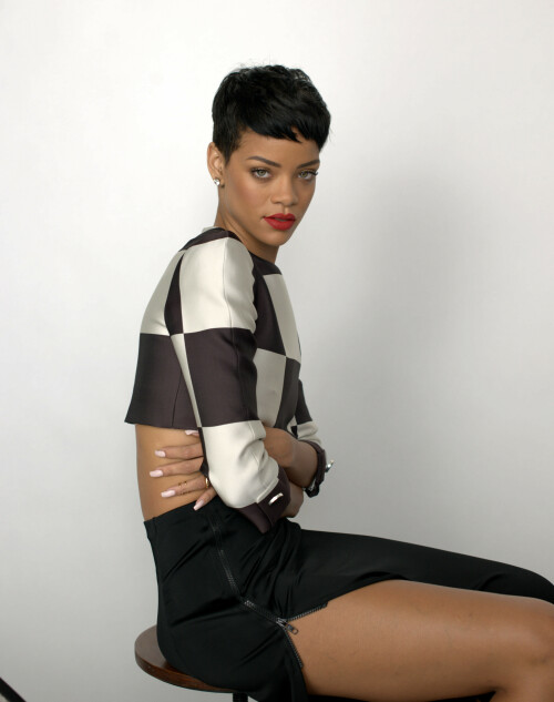 Rihanna | Elle UK 2013 Outtakes

Cover interview Rihanna gave ELLE exclusively for April 2013 issue

Behind The Cover: Rihanna

It’s 11pm in Paris. The cover shoot is over, the interview still to come. This wasn’t the schedule, but, as ever, we’re on Rihanna Time. I’m asked over to her hotel in Place Vendôme, where her director of international marketing is wondering if the bar downstairs might have the right sort of ‘vibe’. Ri and I can sit in the corner, she decides, the security guy keeping intruders at bay, and the rest of the entourage can have a drink nearby – which they do, apart from one who stays within earshot pretending to read emails and leaps up to deliver throat-cutting arm signals every time she hears the words ‘Chris’ or ‘Brown’.

Rihanna floats in at two in the morning and floats out just after three. As you’d imagine, she is charm personified – huge, huge liquid eyes and a west-coast accent with echoes of her Bajan background. A bottle of chilled Chablis shows up and we’re poured a big glass each.

To begin with, I ask her about music. And why not? Auditioned in Barbados, she signed a deal with Jay-Z’s Def Jam Recordings at the age of 16. Her first single, Pon de Replay, was a worldwide hit and she’s now made seven albums, Unapologetic the latest, and sold 200 million records in 74 different countries, assisted by 3.2 billion YouTube hits and over 65 million friends on Facebook. She has had 75 official Number Ones. It’s an astonishing trajectory on every level, and she only turned 25 this February. I’d be happy with just her Air Miles.

I’m fascinated by the way her songs come about, I tell her, as she doesn’t write them. She commissions them. Does she suggest subjects to her songwriters or do they compose them and hope they’ll get recorded?

‘I spend a lot of time with them so they know my story by the time they write, and it’s always the truth. At times I won’t be rebellious or edgy, sometimes it’ll be vulnerable and really innocent but you don’t know what bad things that girl might do to get to the vulnerable state! Sometimes bad girls are tired of bad s***,’ she says.

Songs like Pour it Up and Cheers (Drink to That)… are they warnings about the way men can behave?

‘Not necessarily warnings, it’s just the truth. I happen to think like a man, too, and do certain things guys like to do. I grew up around boys. There was just me and one female cousin in this group of family and friends, so I went to school and I automatically had guy friends and when I came to this industry all my friends happened to be guys. When I was a teenager I wasn’t [romantically] interested in guys at all ’cos I thought I was one of them! They didn’t seem exciting to me, they were more like a pain in my ass. Our conversations were like we were brothers, we would talk all the time. I go to strip clubs – sometimes with men, sometimes on my own. Why? ’Cos I enjoy the music they play there. It has a certain vibe and I watch the girls pole dancing. Even now I will go to, like, an industry event and all the ladies will be over here and all the guys over here and I will go to the guys’ table and sit because I just feel I can have a much better conversation over there. And that’s automatic, it’s not prejudice.’

I tell her I admire her for saying that: it’s not what her record label would want her to say.

‘I said that one time and LA Reid [who signed her to Def Jam] said, “You have to say you’re a girls’ girl because girls are your fans!” He was mad at me,’ she shrugs. ‘But it’s the truth. I’m a tomboy. My best friend Melissa [Forde], she was the one who girled me up. I would go to clubs with her and she’d be dressed up and I’d be wearing, like, sneakers and a bandana and I didn’t find anything wrong with it until she started showing me magazines. And we’d just sort of stare at them, these craaazy fashion stories and these craaazy sex stories! I learned a lot hanging out with Melissa.’

Rihanna’s interest in fashion has grown to the extent that she launches her first collection, with British high-street label River Island, this month.

‘She came to us,’ River Island’s marketing director Josie Roscop tells me, in Paris for the shoot. ‘She loved the fact we were a family-owned British business. Every item in the range has her contribution. We’re not just pulling pieces out of her wardrobe and copying that line. We helped to realise her vision, a nice mix of femininity and a tomboy twist, very chic but with an edge to it.’

‘I love the high-street shops,’ Rihanna tells me when I ask her about the project. ‘The stylish kids on the street, they’re the ones that set the trends. The designers see what they’re doing and go and design their line and sell it back to the same kids and it’s like, why not go directly to the source? High-street shops pay more attention to the kids on the street than to the runways, so in a way I like to mix both. I love a high-end bag or jacket with a simple dress.

I just thought, I’m going to make something for everybody – every personality, every body type.’

Today, I saw for myself what Rihanna-style means. The shoot took place in Montparnasse. The effervescent photographer Mariano Vivanco and crew were at the studio at ten, the talent due at eleven. He set up his cameras and papered the walls with references, shots of Edie Sedgwick, Marilyn Monroe, Bettie Page, Brigitte Nielsen, Twiggy and Linda Evangelista. There were 10 set-ups planned, among them the cover, and various pieces from the River Island collaboration. A tented make-up and hair salon had been erected on the terrace outside, and a changing-room stocked with a range of exotic drinks.

She arrived – and only three hours late!

And out of hair and make-up Rihanna eventually came, even taller than her 5ft 8in on her perilous heels, which immediately tore two gashes in the backdrop and sparked a fit of hand-on-mouth giggles. I watched from 10ft away, fascinated by the ease of her movements, her luminous skin and the shower of blue stars tattooed down her neck and back. A thin gold chain hung across her navel; there’s another, I’m told, between the rings on her nipples. She made sinuous little moves to the music – Gotye, Bowie, Pet Shop Boys, Pointer Sisters – softly mouthing the words ‘You be the match, I will be your fuse,’ to Miguel’s Sure Thing. She draped a long arm around the shoulders of anyone who wanted a picture with her.

This was not my first encounter with the hurricane-level impact of Rihanna. Back in November, around 1,000 people – including me – were packed into a tropically hot dancehall near Checkpoint Charlie in Berlin. Seven camera crews were trained on the stage; a DJ was playing thunderous tunes. They’d all arrived at eight in the evening and it was now well past eleven o’clock.

I had a magical ‘all-areas’ pass so I wandered through security and down into a maze of corridors that led to an underground bunker containing six band members and their technicians, the choreographers, a creative director, the ‘Glam Squad’ (costume designers, hair and make-up), a chef, a masseuse, the management and a host of tour and record-company personnel. At the far end was a room that looked nothing like the rest of this concrete rave palace. It had fur rugs, black curtains, soft furniture and ‘accents of pink’ – pink scented candles, pink lilies, embroidered lengths of pink Chinese silk – specially customised by the hospitality liaison manager to create ‘a comfortable environment’ for the star of the show.

There was an air of expectancy, a sense of calm before the storm. All of us – the band, the entourage, the audience upstairs – were doing the same thing. We were waiting for Rihanna.

We’d spent a lot of that week waiting for Rihanna.

I was on her now-legendary seven-day 777 tour. She had played five shows in five different countries – Mexico, Canada, Sweden, France and now Germany, with England and the States to come – and she’d been late onstage every night. Mention her time-keeping to any member of Team Rihanna and they’d roll their eyes fondly and tell you tales that made your hair curl: long hold-ups in huge arenas, or the time she made it to the wings just seconds before cruising onstage to sing on a live prime-time US TV show.

Crew members called her plane ‘Air Force One’, the name for the presidential jet, and the girl herself gave the glorious impression that life was just one big party with herself at the centre of it. ‘This is my rock’n’roll fantasy and it’s sure to be a wild ride,’ she’d announced before we took off and, bang on message, she’d grabbed the intercom between LA and Mexico City and shouted, ‘This is an emergency! Welcome to 777! Make some noise and let’s get drunk!’ Minutes later an air hostess was distributing glasses, Rihanna right behind her tipping out gold bottles of Ace of Spades champagne. ‘And if you really want to black out,’ her PA shouted, ‘we’ve got Cognac!’

This is the most over-the-top, all-hours event I’ve ever witnessed. I’ve travelled round America in U2’s private jet, but it was the very model of calm and efficiency. I was on a Rod Stewart tour, but that seems cut-price in comparison. I spent a week in Italy with hard-living Frankie Goes to Hollywood but at least we got some sleep at nights. But the Rihanna tour… I haven’t had so much fun for years.

When she eventually rolled up backstage in Berlin, everything clicked into the quietly controlled overdrive that indicates the queen has arrived at the hive. She was shepherded to her ‘Rihanna-ised’ dressing-room compound and the sweet scent of marijuana drifted over the curtains. Then she emerged to join the nightly ritual known as ‘The Prayer’, the signal that she’s finally ready to perform. The band locked arms in a huddle and the chant began, led by teetotal, God-fearing bassist Adam Blackstone (Ri’s musical director): ‘Dear Lord, bless this band, bless every beat of its drum, every note it sings. Bless every instrument and the sound it makes. We love you, God. Seven-Seven-Seven! BERRRLIIIIIIN!!’

When Rihanna (finally) arrives anywhere you get the same strange mix of emotions: a sense of relief that whatever was waiting to start can begin, and an overwhelming sensation – terrible but true – that you want to forgive her for everything because she’s just so fantastically pretty. There’s a loud, collective sigh all around you – men, women, teenage kids. She’s so beautiful it’s overpowering, the sort of mesmerising looks that can melt a room simply by entering it. Her huge lips and feline hazel eyes radiate a frailty and innocence known only to the impossibly cute heroines of Disney cartoons. But the rolling rhythm of her walk, the occasional narrow glance and the handgun tattooed below her right shoulder send off a whole different set of signals. It’s the same with the way she dances – one minute it’s little tottering high-heeled steps, sexy and vulnerable; next it’s the lascivious self-stroking moves of a high-class hooker.

How incredible to be that good-looking. To be able to raise the sum of human happiness just by turning up. How wonderful that would feel. Wonderful – and maybe slightly corrupting.

What do you think you represent for women? ‘I think women want freedom, they want to be empowered, they want hope, they want love, they want all the things that I want and I’m not afraid to say those things and act on them, and I think that’s why they identify with me. Women want to be fearless and sometimes all it takes is to see that it’s possible. Once you see it can be done, you think “I could do it, too.” That’s all I could ever hope for, to have a positive effect on women. ’Cos women are powerful, powerful beings. But they’re also the most doubtful beings. They’ll never know – we’ll never know – how powerful we are.’

Why not?

‘I don’t know. I don’t know if it’s the way society has trained us…’ she says, trailing off. ‘Women never know their full worth. Or sometimes they’re in denial about it. Or sometimes they’re afraid to have the right to it. That’s just a thing about us. But I find that men know their worth and their limits and they stick to that, it’s very simple.’

But you’ve had a lot of inspirational women in your life.

‘I’ve had incredible women – my mum, my grandmum, my best friends! I’ve got this Isis tattoo [on her ribcage] to symbolise my grandmother. Isis was an Egyptian goddess who taught women to be complete women – how to cook, how to clean, how to wash clothes, how to survive and not be slaves to men. She taught them to be independent women and to make things happen by themselves. And that’s the attitude of all the women in my family, and my grandmother was the one who first really taught me that. My mum, though, was exposed to certain things in life and that made her a little harder and maybe a little colder than other women. And I’m very much like her.’

This is the break-up with your father, right?

‘Yes. He wasn’t the best husband in the world but he was an amazing father. And that’s what he is to me, not my husband but my father. It was a relief when he was gone but I guess I loved him.’

Did their bitter divorce change the way you thought about relationships with men?

‘Well my mum never had to tell me anything. I figured it out by watching and sensing. Children know. People think children are stupid. Kids are not stupid. If my parents were angry with each other I could feel the energy in the room, whether they were arguing or not. It’s painful to watch your mum go through certain things. I learned a lot, you know.’

You might know this part of the story already. The middle-class Lady Gaga may have brought misfortune upon herself, but Robyn Rihanna Fenty was born into it. When she was 16, her mother divorced her crack-addicted father and had to work round the clock to support the family, leaving Ri to look after her younger brother, Rajad; ‘Probably the best summer I ever had,’ she tells me with touching maternal pride. ‘He’s growing so fast now,’ and she shakes her head. ‘Heeey, slow doooooown!’

She was obsessed with Madonna – ‘I loved the way she reinvented herself, like an actress always playing a different role’ – and was ‘sucked in by the tone and angelic sound’ of Whitney Houston. She also idolised the local hero Bob Marley and began singing pop and reggae (her single Man Down is pure Jamaican dancehall).

But in February 2009, an event occurred that was – in the light of her hard-living bravado, her apparent confidence, and first-hand experience – hard to understand, and impossible to overlook. When a Los Angeles Police Department photograph was leaked to the TMZ website, the world was horrified to discover that she’d been badly beaten up. The R&B artist Chris Brown, her boyfriend, was charged with assault and placed under a restraining order that forbade him to be within 50 yards of her, reduced – in a bizarre legal twist – to 10 yards if the two of them had to appear at the same industry awards.

The bleak mystery of this miserable tale still casts a long shadow. The girl who could have everything – a symbol of strength, independence and opportunity – appeared to be in the worst relationship imaginable. With the nearby minder leaping in repeatedly to say the interview’s ending if the subject doesn’t change, it takes four attempts and a fair amount of subterfuge to piece together the conversation that follows. Twice, curiously, she moves back to the topic herself, talking in an intense low whisper, clearly wanting to make a point. The song Stay on the new album must be about Chris Brown, I suggest.

‘Stay is a story about having love that close and wanting it to last forever. You don’t have that feeling with everybody so when you have it you don’t want to let go of it. I would definitely say that he is the one I have that kind of relationship with.’

You must want us to know that relationship is back on as you keep tweeting pictures of you both lying on beds.

‘Well I Instagram everything about my life, whether it’s smoking pot, in a strip club, reading a Bible verse – how crazy, I know! – or hanging out with my best friend, who happens to be Chris. And right now that’s just what we want, a great friendship that’s unbreakable. Now that we’re adults we can do this right. We got a fresh start and I’m thankful for that.’

It must be strange having the whole world telling you how to run your life.

‘I know, but I got used to it. And I understand it. Everybody has an opinion about everything. But an opinion is just an opinion – I can only respect it but I can’t do anything to change their minds or to change the way I feel. Nothing is going to change because of their opinion. Everybody wanted to know what was happening in my life. Is she a drug addict? No. Is she an alcoholic? No. Is she a victim? No. That’s when I got the gun,’ she points to her handgun tattoo. ‘It was a symbol of strength – it was “I’ll never be a victim!” I had all these eyes on me, critic after critic after critic! I’d heard so many things I was kind of numb to it. When I had my breaking point – my turning point, sorry – I got enough s*** where I had to make a decision. I was like, who am I trying to please? None of these motherf***ers know me! Why do I care about what they think? I started thinking, what if I went my whole life trying to please everybody? You will never please everybody. And you haven’t pleased yourself ’cos you’ve been so busy trying to please everybody and then it’s too late. I had to have that breakthrough, to tap into who I really was. And the truth. And trusting myself again.’

So you thought you were deceiving people?

‘Yeah. I think I came to a point where I started lying to myself. And it’s so hard to live a lie,’ she shakes her head. ‘It’s just too hard. It’s too difficult. It’s too much to think about. That’s why I’m posting pictures of myself smoking pot, to tell the truth about myself. I’ve got so much to think about, why bring all this extra s*** by being dishonest? When somebody else lies to you, you don’t trust them. Trying lying to yourself, that’s even worse. You can’t paint a fake picture for too long before the truth comes out and then it’s hard that it doesn’t match up.’

So your new policy is all about honesty?

‘It’s all about honesty. This is not failure, it’s lessons. It’s not the end. If you learn from mistakes it’s not failure. If you go and do the exact same f***ing thing then that’s the stupidest thing ever and it probably won’t work the second time.’

But that violence of 2009 still seems unacceptable to an outsider. Your father had an abusive relationship with your mother – did that make you more accepting of Chris Brown’s behaviour than others might have been?

‘No, I didn’t “accept” anything! I’m not accepting anything that’s wrong! What’s wrong is wrong, no matter who it’s coming from and that’s just that.’

But you’ve obviously forgiven him.

‘Yeah.’

Why?

‘I have my own reasons, very very private reasons. Very personal.’ She’s speaking very quietly. ‘A lot of things. Bottom line – I know him. I had a lot to think about and I had a lot of time to think about it. I was trying to do this for myself. I did not notice how many women were going through the same thing as I was. I didn’t notice how many women were in a limbo of love, a dilemma. And with every aspect there was a different crowd of women who identified with different things.’

Everyone in your entourage seems slightly afraid of you and it’s probably been that way since you first had hits aged 16. Does that make it attractive to meet someone like Chris, someone you might be slightly afraid of yourself?

‘Ooh, you don’t know my mother!’ she laughs loudly, cleverly switching tack. ‘She’s the scariest person I know. I’m not afraid of any person in this world but her. I’m terrified of her! She called me two days ago and reeled me in about two naked pictures Melissa put up on Instagram – a sneak-peek from a photo book she’s making about me. My mom, she went crazy on me. I was like embarrassed. I felt like I got my ass whupped in front of my class in school!’

What did she say?

‘She said, “This was like a private moment and you’re just parading this around.” Mummy, first of all this is a book and… “You’re just excluding all your younger fans!” Mummy, then they’re not fans. You’re either a fan or you’re not. I’m not excluding anybody, you have to be yourself. She was yelling at me. She humbled the f*** out of me!’

Frantic gesticulations from the next table insist there’s time for only one more question. So I go for this and it’s strangely revealing: Rihanna, where would you like to be in five years’ time?

‘Shall I say this?’ She glances at her minders and leans in. ‘I will probably have a kid,’ she says, softly. ‘And I’m praying I can go on vacation for a good month. And I’ll have set up some things so I don’t have to tour for the rest of my life, even though I love touring. I want health and happiness in five years. I want to be healthy and happy.’

And who’ll be the father of this child?

‘Now who the hell would that be!’ she shouts theatrically to anyone still left in the bar, then gives me a smile that seems to me to be unambiguous. It’s the man we’ve just been talking about.

She affects an air of mystery. ‘I can’t tell you that,’ she says. ‘It’s not my business. It’s God’s business!’

ELLE #Rihanna