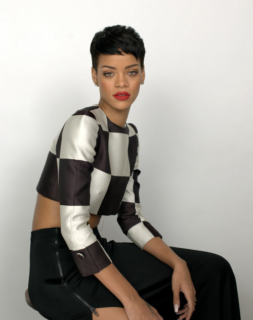 Rihanna | Elle UK 2013 Outtakes

Cover interview Rihanna gave ELLE exclusively for April 2013 issue

Behind The Cover: Rihanna

It’s 11pm in Paris. The cover shoot is over, the interview still to come. This wasn’t the schedule, but, as ever, we’re on Rihanna Time. I’m asked over to her hotel in Place Vendôme, where her director of international marketing is wondering if the bar downstairs might have the right sort of ‘vibe’. Ri and I can sit in the corner, she decides, the security guy keeping intruders at bay, and the rest of the entourage can have a drink nearby – which they do, apart from one who stays within earshot pretending to read emails and leaps up to deliver throat-cutting arm signals every time she hears the words ‘Chris’ or ‘Brown’.

Rihanna floats in at two in the morning and floats out just after three. As you’d imagine, she is charm personified – huge, huge liquid eyes and a west-coast accent with echoes of her Bajan background. A bottle of chilled Chablis shows up and we’re poured a big glass each.

To begin with, I ask her about music. And why not? Auditioned in Barbados, she signed a deal with Jay-Z’s Def Jam Recordings at the age of 16. Her first single, Pon de Replay, was a worldwide hit and she’s now made seven albums, Unapologetic the latest, and sold 200 million records in 74 different countries, assisted by 3.2 billion YouTube hits and over 65 million friends on Facebook. She has had 75 official Number Ones. It’s an astonishing trajectory on every level, and she only turned 25 this February. I’d be happy with just her Air Miles.

I’m fascinated by the way her songs come about, I tell her, as she doesn’t write them. She commissions them. Does she suggest subjects to her songwriters or do they compose them and hope they’ll get recorded?

‘I spend a lot of time with them so they know my story by the time they write, and it’s always the truth. At times I won’t be rebellious or edgy, sometimes it’ll be vulnerable and really innocent but you don’t know what bad things that girl might do to get to the vulnerable state! Sometimes bad girls are tired of bad s***,’ she says.

Songs like Pour it Up and Cheers (Drink to That)… are they warnings about the way men can behave?

‘Not necessarily warnings, it’s just the truth. I happen to think like a man, too, and do certain things guys like to do. I grew up around boys. There was just me and one female cousin in this group of family and friends, so I went to school and I automatically had guy friends and when I came to this industry all my friends happened to be guys. When I was a teenager I wasn’t [romantically] interested in guys at all ’cos I thought I was one of them! They didn’t seem exciting to me, they were more like a pain in my ass. Our conversations were like we were brothers, we would talk all the time. I go to strip clubs – sometimes with men, sometimes on my own. Why? ’Cos I enjoy the music they play there. It has a certain vibe and I watch the girls pole dancing. Even now I will go to, like, an industry event and all the ladies will be over here and all the guys over here and I will go to the guys’ table and sit because I just feel I can have a much better conversation over there. And that’s automatic, it’s not prejudice.’

I tell her I admire her for saying that: it’s not what her record label would want her to say.

‘I said that one time and LA Reid [who signed her to Def Jam] said, “You have to say you’re a girls’ girl because girls are your fans!” He was mad at me,’ she shrugs. ‘But it’s the truth. I’m a tomboy. My best friend Melissa [Forde], she was the one who girled me up. I would go to clubs with her and she’d be dressed up and I’d be wearing, like, sneakers and a bandana and I didn’t find anything wrong with it until she started showing me magazines. And we’d just sort of stare at them, these craaazy fashion stories and these craaazy sex stories! I learned a lot hanging out with Melissa.’

Rihanna’s interest in fashion has grown to the extent that she launches her first collection, with British high-street label River Island, this month.

‘She came to us,’ River Island’s marketing director Josie Roscop tells me, in Paris for the shoot. ‘She loved the fact we were a family-owned British business. Every item in the range has her contribution. We’re not just pulling pieces out of her wardrobe and copying that line. We helped to realise her vision, a nice mix of femininity and a tomboy twist, very chic but with an edge to it.’

‘I love the high-street shops,’ Rihanna tells me when I ask her about the project. ‘The stylish kids on the street, they’re the ones that set the trends. The designers see what they’re doing and go and design their line and sell it back to the same kids and it’s like, why not go directly to the source? High-street shops pay more attention to the kids on the street than to the runways, so in a way I like to mix both. I love a high-end bag or jacket with a simple dress.

I just thought, I’m going to make something for everybody – every personality, every body type.’

Today, I saw for myself what Rihanna-style means. The shoot took place in Montparnasse. The effervescent photographer Mariano Vivanco and crew were at the studio at ten, the talent due at eleven. He set up his cameras and papered the walls with references, shots of Edie Sedgwick, Marilyn Monroe, Bettie Page, Brigitte Nielsen, Twiggy and Linda Evangelista. There were 10 set-ups planned, among them the cover, and various pieces from the River Island collaboration. A tented make-up and hair salon had been erected on the terrace outside, and a changing-room stocked with a range of exotic drinks.

She arrived – and only three hours late!

And out of hair and make-up Rihanna eventually came, even taller than her 5ft 8in on her perilous heels, which immediately tore two gashes in the backdrop and sparked a fit of hand-on-mouth giggles. I watched from 10ft away, fascinated by the ease of her movements, her luminous skin and the shower of blue stars tattooed down her neck and back. A thin gold chain hung across her navel; there’s another, I’m told, between the rings on her nipples. She made sinuous little moves to the music – Gotye, Bowie, Pet Shop Boys, Pointer Sisters – softly mouthing the words ‘You be the match, I will be your fuse,’ to Miguel’s Sure Thing. She draped a long arm around the shoulders of anyone who wanted a picture with her.

This was not my first encounter with the hurricane-level impact of Rihanna. Back in November, around 1,000 people – including me – were packed into a tropically hot dancehall near Checkpoint Charlie in Berlin. Seven camera crews were trained on the stage; a DJ was playing thunderous tunes. They’d all arrived at eight in the evening and it was now well past eleven o’clock.

I had a magical ‘all-areas’ pass so I wandered through security and down into a maze of corridors that led to an underground bunker containing six band members and their technicians, the choreographers, a creative director, the ‘Glam Squad’ (costume designers, hair and make-up), a chef, a masseuse, the management and a host of tour and record-company personnel. At the far end was a room that looked nothing like the rest of this concrete rave palace. It had fur rugs, black curtains, soft furniture and ‘accents of pink’ – pink scented candles, pink lilies, embroidered lengths of pink Chinese silk – specially customised by the hospitality liaison manager to create ‘a comfortable environment’ for the star of the show.

There was an air of expectancy, a sense of calm before the storm. All of us – the band, the entourage, the audience upstairs – were doing the same thing. We were waiting for Rihanna.

We’d spent a lot of that week waiting for Rihanna.

I was on her now-legendary seven-day 777 tour. She had played five shows in five different countries – Mexico, Canada, Sweden, France and now Germany, with England and the States to come – and she’d been late onstage every night. Mention her time-keeping to any member of Team Rihanna and they’d roll their eyes fondly and tell you tales that made your hair curl: long hold-ups in huge arenas, or the time she made it to the wings just seconds before cruising onstage to sing on a live prime-time US TV show.

Crew members called her plane ‘Air Force One’, the name for the presidential jet, and the girl herself gave the glorious impression that life was just one big party with herself at the centre of it. ‘This is my rock’n’roll fantasy and it’s sure to be a wild ride,’ she’d announced before we took off and, bang on message, she’d grabbed the intercom between LA and Mexico City and shouted, ‘This is an emergency! Welcome to 777! Make some noise and let’s get drunk!’ Minutes later an air hostess was distributing glasses, Rihanna right behind her tipping out gold bottles of Ace of Spades champagne. ‘And if you really want to black out,’ her PA shouted, ‘we’ve got Cognac!’

This is the most over-the-top, all-hours event I’ve ever witnessed. I’ve travelled round America in U2’s private jet, but it was the very model of calm and efficiency. I was on a Rod Stewart tour, but that seems cut-price in comparison. I spent a week in Italy with hard-living Frankie Goes to Hollywood but at least we got some sleep at nights. But the Rihanna tour… I haven’t had so much fun for years.

When she eventually rolled up backstage in Berlin, everything clicked into the quietly controlled overdrive that indicates the queen has arrived at the hive. She was shepherded to her ‘Rihanna-ised’ dressing-room compound and the sweet scent of marijuana drifted over the curtains. Then she emerged to join the nightly ritual known as ‘The Prayer’, the signal that she’s finally ready to perform. The band locked arms in a huddle and the chant began, led by teetotal, God-fearing bassist Adam Blackstone (Ri’s musical director): ‘Dear Lord, bless this band, bless every beat of its drum, every note it sings. Bless every instrument and the sound it makes. We love you, God. Seven-Seven-Seven! BERRRLIIIIIIN!!’

When Rihanna (finally) arrives anywhere you get the same strange mix of emotions: a sense of relief that whatever was waiting to start can begin, and an overwhelming sensation – terrible but true – that you want to forgive her for everything because she’s just so fantastically pretty. There’s a loud, collective sigh all around you – men, women, teenage kids. She’s so beautiful it’s overpowering, the sort of mesmerising looks that can melt a room simply by entering it. Her huge lips and feline hazel eyes radiate a frailty and innocence known only to the impossibly cute heroines of Disney cartoons. But the rolling rhythm of her walk, the occasional narrow glance and the handgun tattooed below her right shoulder send off a whole different set of signals. It’s the same with the way she dances – one minute it’s little tottering high-heeled steps, sexy and vulnerable; next it’s the lascivious self-stroking moves of a high-class hooker.

How incredible to be that good-looking. To be able to raise the sum of human happiness just by turning up. How wonderful that would feel. Wonderful – and maybe slightly corrupting.

What do you think you represent for women? ‘I think women want freedom, they want to be empowered, they want hope, they want love, they want all the things that I want and I’m not afraid to say those things and act on them, and I think that’s why they identify with me. Women want to be fearless and sometimes all it takes is to see that it’s possible. Once you see it can be done, you think “I could do it, too.” That’s all I could ever hope for, to have a positive effect on women. ’Cos women are powerful, powerful beings. But they’re also the most doubtful beings. They’ll never know – we’ll never know – how powerful we are.’

Why not?

‘I don’t know. I don’t know if it’s the way society has trained us…’ she says, trailing off. ‘Women never know their full worth. Or sometimes they’re in denial about it. Or sometimes they’re afraid to have the right to it. That’s just a thing about us. But I find that men know their worth and their limits and they stick to that, it’s very simple.’

But you’ve had a lot of inspirational women in your life.

‘I’ve had incredible women – my mum, my grandmum, my best friends! I’ve got this Isis tattoo [on her ribcage] to symbolise my grandmother. Isis was an Egyptian goddess who taught women to be complete women – how to cook, how to clean, how to wash clothes, how to survive and not be slaves to men. She taught them to be independent women and to make things happen by themselves. And that’s the attitude of all the women in my family, and my grandmother was the one who first really taught me that. My mum, though, was exposed to certain things in life and that made her a little harder and maybe a little colder than other women. And I’m very much like her.’

This is the break-up with your father, right?

‘Yes. He wasn’t the best husband in the world but he was an amazing father. And that’s what he is to me, not my husband but my father. It was a relief when he was gone but I guess I loved him.’

Did their bitter divorce change the way you thought about relationships with men?

‘Well my mum never had to tell me anything. I figured it out by watching and sensing. Children know. People think children are stupid. Kids are not stupid. If my parents were angry with each other I could feel the energy in the room, whether they were arguing or not. It’s painful to watch your mum go through certain things. I learned a lot, you know.’

You might know this part of the story already. The middle-class Lady Gaga may have brought misfortune upon herself, but Robyn Rihanna Fenty was born into it. When she was 16, her mother divorced her crack-addicted father and had to work round the clock to support the family, leaving Ri to look after her younger brother, Rajad; ‘Probably the best summer I ever had,’ she tells me with touching maternal pride. ‘He’s growing so fast now,’ and she shakes her head. ‘Heeey, slow doooooown!’

She was obsessed with Madonna – ‘I loved the way she reinvented herself, like an actress always playing a different role’ – and was ‘sucked in by the tone and angelic sound’ of Whitney Houston. She also idolised the local hero Bob Marley and began singing pop and reggae (her single Man Down is pure Jamaican dancehall).

But in February 2009, an event occurred that was – in the light of her hard-living bravado, her apparent confidence, and first-hand experience – hard to understand, and impossible to overlook. When a Los Angeles Police Department photograph was leaked to the TMZ website, the world was horrified to discover that she’d been badly beaten up. The R&B artist Chris Brown, her boyfriend, was charged with assault and placed under a restraining order that forbade him to be within 50 yards of her, reduced – in a bizarre legal twist – to 10 yards if the two of them had to appear at the same industry awards.

The bleak mystery of this miserable tale still casts a long shadow. The girl who could have everything – a symbol of strength, independence and opportunity – appeared to be in the worst relationship imaginable. With the nearby minder leaping in repeatedly to say the interview’s ending if the subject doesn’t change, it takes four attempts and a fair amount of subterfuge to piece together the conversation that follows. Twice, curiously, she moves back to the topic herself, talking in an intense low whisper, clearly wanting to make a point. The song Stay on the new album must be about Chris Brown, I suggest.

‘Stay is a story about having love that close and wanting it to last forever. You don’t have that feeling with everybody so when you have it you don’t want to let go of it. I would definitely say that he is the one I have that kind of relationship with.’

You must want us to know that relationship is back on as you keep tweeting pictures of you both lying on beds.

‘Well I Instagram everything about my life, whether it’s smoking pot, in a strip club, reading a Bible verse – how crazy, I know! – or hanging out with my best friend, who happens to be Chris. And right now that’s just what we want, a great friendship that’s unbreakable. Now that we’re adults we can do this right. We got a fresh start and I’m thankful for that.’

It must be strange having the whole world telling you how to run your life.

‘I know, but I got used to it. And I understand it. Everybody has an opinion about everything. But an opinion is just an opinion – I can only respect it but I can’t do anything to change their minds or to change the way I feel. Nothing is going to change because of their opinion. Everybody wanted to know what was happening in my life. Is she a drug addict? No. Is she an alcoholic? No. Is she a victim? No. That’s when I got the gun,’ she points to her handgun tattoo. ‘It was a symbol of strength – it was “I’ll never be a victim!” I had all these eyes on me, critic after critic after critic! I’d heard so many things I was kind of numb to it. When I had my breaking point – my turning point, sorry – I got enough s*** where I had to make a decision. I was like, who am I trying to please? None of these motherf***ers know me! Why do I care about what they think? I started thinking, what if I went my whole life trying to please everybody? You will never please everybody. And you haven’t pleased yourself ’cos you’ve been so busy trying to please everybody and then it’s too late. I had to have that breakthrough, to tap into who I really was. And the truth. And trusting myself again.’

So you thought you were deceiving people?

‘Yeah. I think I came to a point where I started lying to myself. And it’s so hard to live a lie,’ she shakes her head. ‘It’s just too hard. It’s too difficult. It’s too much to think about. That’s why I’m posting pictures of myself smoking pot, to tell the truth about myself. I’ve got so much to think about, why bring all this extra s*** by being dishonest? When somebody else lies to you, you don’t trust them. Trying lying to yourself, that’s even worse. You can’t paint a fake picture for too long before the truth comes out and then it’s hard that it doesn’t match up.’

So your new policy is all about honesty?

‘It’s all about honesty. This is not failure, it’s lessons. It’s not the end. If you learn from mistakes it’s not failure. If you go and do the exact same f***ing thing then that’s the stupidest thing ever and it probably won’t work the second time.’

But that violence of 2009 still seems unacceptable to an outsider. Your father had an abusive relationship with your mother – did that make you more accepting of Chris Brown’s behaviour than others might have been?

‘No, I didn’t “accept” anything! I’m not accepting anything that’s wrong! What’s wrong is wrong, no matter who it’s coming from and that’s just that.’

But you’ve obviously forgiven him.

‘Yeah.’

Why?

‘I have my own reasons, very very private reasons. Very personal.’ She’s speaking very quietly. ‘A lot of things. Bottom line – I know him. I had a lot to think about and I had a lot of time to think about it. I was trying to do this for myself. I did not notice how many women were going through the same thing as I was. I didn’t notice how many women were in a limbo of love, a dilemma. And with every aspect there was a different crowd of women who identified with different things.’

Everyone in your entourage seems slightly afraid of you and it’s probably been that way since you first had hits aged 16. Does that make it attractive to meet someone like Chris, someone you might be slightly afraid of yourself?

‘Ooh, you don’t know my mother!’ she laughs loudly, cleverly switching tack. ‘She’s the scariest person I know. I’m not afraid of any person in this world but her. I’m terrified of her! She called me two days ago and reeled me in about two naked pictures Melissa put up on Instagram – a sneak-peek from a photo book she’s making about me. My mom, she went crazy on me. I was like embarrassed. I felt like I got my ass whupped in front of my class in school!’

What did she say?

‘She said, “This was like a private moment and you’re just parading this around.” Mummy, first of all this is a book and… “You’re just excluding all your younger fans!” Mummy, then they’re not fans. You’re either a fan or you’re not. I’m not excluding anybody, you have to be yourself. She was yelling at me. She humbled the f*** out of me!’

Frantic gesticulations from the next table insist there’s time for only one more question. So I go for this and it’s strangely revealing: Rihanna, where would you like to be in five years’ time?

‘Shall I say this?’ She glances at her minders and leans in. ‘I will probably have a kid,’ she says, softly. ‘And I’m praying I can go on vacation for a good month. And I’ll have set up some things so I don’t have to tour for the rest of my life, even though I love touring. I want health and happiness in five years. I want to be healthy and happy.’

And who’ll be the father of this child?

‘Now who the hell would that be!’ she shouts theatrically to anyone still left in the bar, then gives me a smile that seems to me to be unambiguous. It’s the man we’ve just been talking about.

She affects an air of mystery. ‘I can’t tell you that,’ she says. ‘It’s not my business. It’s God’s business!’

ELLE #Rihanna