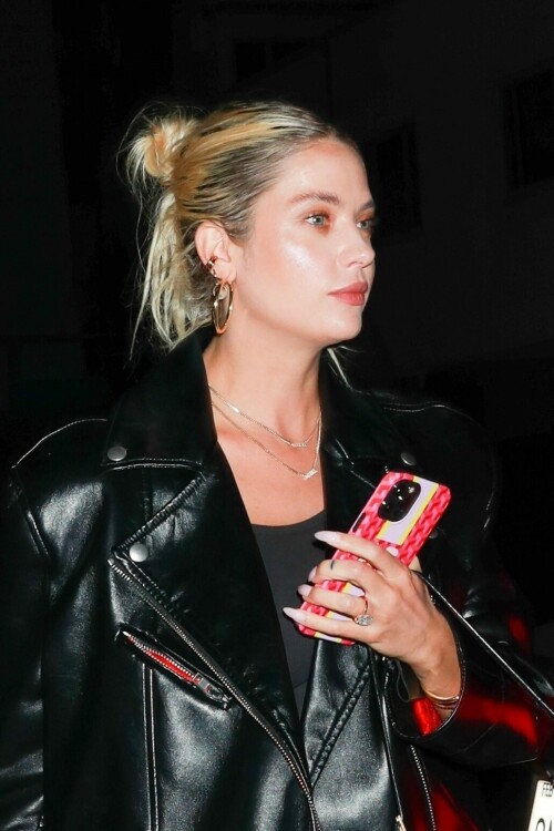 Ashley Benson | Sports her engagement ring during a date night with Brandon Davis at celebrity hotspot Giorgio Baldi in Santa Monica - August 27, 2023

Ashley Benson reveals her taut midriff in a crop top as she's seen arriving at her oil heir fiancé Brandon Davis' apartment in Los Angeles

Ashley Benson put on a casual display as she was spotted out in Los Angeles on Monday.

The actress, 33, was seen in a laid-back yet chic outfit as she arrived at her fiancé Brandon Davis' apartment.

Benson's outfit consisted of a cropped white T-shirt, a pair of blue denim jeans and a pair of brown pointed bootie heels.

The former Pretty Little Liars star completed her look with a pair of black sunglasses, a pair of earrings, several gold bracelets on one of her wrists, her engagement ring, and a brown mini-designer bag from Fendi.

She wore her long blonde hair down and had it slicked back behind both her ears.

Benson was photographed exiting out of her black car as she made her way into her fiancé's apartment complex.

The sighting of the actress on August 28th comes a day after she was spotted with Davis grabbing dinner at the celebrity hotspot Giorgio Baldi, named after the late chef of the same name, in nearby Santa Monica.


The Italian restaurant has been a favorite among the celebrities since the late Baldi opened the place almost 30 years ago.

In addition to Benson and Davis, other well-known names who are frequent customers of and/or have been spotted at Giorgio Baldi include Rihanna, Al Pacino, Hailey Bieber, Jonah Hill, and Jeff Bezos and his fiancée Lauren Sanchez, to name a few.

Benson and Davis, who have a 10-year age gap, began dating in January 2023 and their relationship was reported until a month later after the pair were spotted sitting courtside at a Los Angeles basketball game.

Both have largely kept their romantic relationship private, which is typical for Benson as she revealed in an interview with Cosmopolitan UK in 2021 that she tends to keep all of her relationships private.

'You obviously can't help if you get photographed together. [But] it's more sacred that way. Those private moments are for you and your partner, and I think it's best not to be over-exposed, and you can really protect your relationship if you're not exploiting it.' The Spring Breakers star stated.

The couple announced their engagement last month when Davis shared a photo on his Instagram story of Benson wearing a large diamond on her ring finger. 'Love of my life', Davis wrote around the photo on his Instagram Stories.

The Spring Breakers star posted her fiancé's Instagram story onto her own Instagram stories, writing, 'My best frienddddd, I love you.'

Benson previously dated model Cara Delevingne from 2018 to 2020 and rapper G-Eazy from 2020 to 2021. While Davis isn't an actor, he previously dated actress Mischa Barton from 2004 to 2005.

The marriage will make Benson become part of a famous and wealthy family as Brandon is an heir to massive fortune. His maternal grandfather is the late Martin Davis, who built his wealth as the chair of Davis Petroleum and at one point, owned 20th Century Fox film studios.

In addition to his late billionaire grandfather, Brandon has several other notable and famous relatives on his mother's side of the family. One of his uncle's (an older sibling of Brandon's mother) is John Davis, the film producer and founder of the American film and production company Davis Entertainment.

Also, one of Brandon's four siblings is the late actor Jason Davis, who voiced the character Mikey Blumberg in the animated television series Recess. Jason passed away on February 16, 2020 at the age of 35 due to an accidental fentanyl overdose.

DailyMail

#AshleyBenson #BrandonDavis