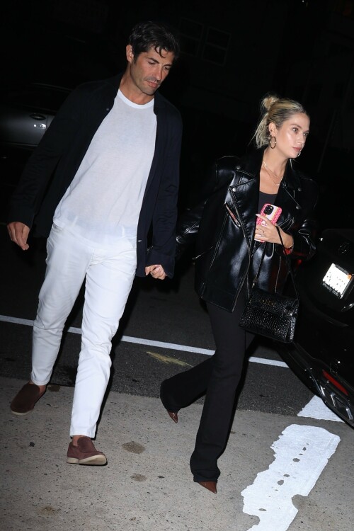 Ashley Benson | Sports her engagement ring during a date night with Brandon Davis at celebrity hotspot Giorgio Baldi in Santa Monica - August 27, 2023

Ashley Benson reveals her taut midriff in a crop top as she's seen arriving at her oil heir fiancé Brandon Davis' apartment in Los Angeles

Ashley Benson put on a casual display as she was spotted out in Los Angeles on Monday.

The actress, 33, was seen in a laid-back yet chic outfit as she arrived at her fiancé Brandon Davis' apartment.

Benson's outfit consisted of a cropped white T-shirt, a pair of blue denim jeans and a pair of brown pointed bootie heels.

The former Pretty Little Liars star completed her look with a pair of black sunglasses, a pair of earrings, several gold bracelets on one of her wrists, her engagement ring, and a brown mini-designer bag from Fendi.

She wore her long blonde hair down and had it slicked back behind both her ears.

Benson was photographed exiting out of her black car as she made her way into her fiancé's apartment complex.

The sighting of the actress on August 28th comes a day after she was spotted with Davis grabbing dinner at the celebrity hotspot Giorgio Baldi, named after the late chef of the same name, in nearby Santa Monica.


The Italian restaurant has been a favorite among the celebrities since the late Baldi opened the place almost 30 years ago.

In addition to Benson and Davis, other well-known names who are frequent customers of and/or have been spotted at Giorgio Baldi include Rihanna, Al Pacino, Hailey Bieber, Jonah Hill, and Jeff Bezos and his fiancée Lauren Sanchez, to name a few.

Benson and Davis, who have a 10-year age gap, began dating in January 2023 and their relationship was reported until a month later after the pair were spotted sitting courtside at a Los Angeles basketball game.

Both have largely kept their romantic relationship private, which is typical for Benson as she revealed in an interview with Cosmopolitan UK in 2021 that she tends to keep all of her relationships private.

'You obviously can't help if you get photographed together. [But] it's more sacred that way. Those private moments are for you and your partner, and I think it's best not to be over-exposed, and you can really protect your relationship if you're not exploiting it.' The Spring Breakers star stated.

The couple announced their engagement last month when Davis shared a photo on his Instagram story of Benson wearing a large diamond on her ring finger. 'Love of my life', Davis wrote around the photo on his Instagram Stories.

The Spring Breakers star posted her fiancé's Instagram story onto her own Instagram stories, writing, 'My best frienddddd, I love you.'

Benson previously dated model Cara Delevingne from 2018 to 2020 and rapper G-Eazy from 2020 to 2021. While Davis isn't an actor, he previously dated actress Mischa Barton from 2004 to 2005.

The marriage will make Benson become part of a famous and wealthy family as Brandon is an heir to massive fortune. His maternal grandfather is the late Martin Davis, who built his wealth as the chair of Davis Petroleum and at one point, owned 20th Century Fox film studios.

In addition to his late billionaire grandfather, Brandon has several other notable and famous relatives on his mother's side of the family. One of his uncle's (an older sibling of Brandon's mother) is John Davis, the film producer and founder of the American film and production company Davis Entertainment.

Also, one of Brandon's four siblings is the late actor Jason Davis, who voiced the character Mikey Blumberg in the animated television series Recess. Jason passed away on February 16, 2020 at the age of 35 due to an accidental fentanyl overdose.

DailyMail

#AshleyBenson #BrandonDavis