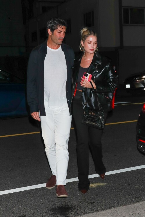 Ashley Benson | Sports her engagement ring during a date night with Brandon Davis at celebrity hotspot Giorgio Baldi in Santa Monica - August 27, 2023

Ashley Benson reveals her taut midriff in a crop top as she's seen arriving at her oil heir fiancé Brandon Davis' apartment in Los Angeles

Ashley Benson put on a casual display as she was spotted out in Los Angeles on Monday.

The actress, 33, was seen in a laid-back yet chic outfit as she arrived at her fiancé Brandon Davis' apartment.

Benson's outfit consisted of a cropped white T-shirt, a pair of blue denim jeans and a pair of brown pointed bootie heels.

The former Pretty Little Liars star completed her look with a pair of black sunglasses, a pair of earrings, several gold bracelets on one of her wrists, her engagement ring, and a brown mini-designer bag from Fendi.

She wore her long blonde hair down and had it slicked back behind both her ears.

Benson was photographed exiting out of her black car as she made her way into her fiancé's apartment complex.

The sighting of the actress on August 28th comes a day after she was spotted with Davis grabbing dinner at the celebrity hotspot Giorgio Baldi, named after the late chef of the same name, in nearby Santa Monica.


The Italian restaurant has been a favorite among the celebrities since the late Baldi opened the place almost 30 years ago.

In addition to Benson and Davis, other well-known names who are frequent customers of and/or have been spotted at Giorgio Baldi include Rihanna, Al Pacino, Hailey Bieber, Jonah Hill, and Jeff Bezos and his fiancée Lauren Sanchez, to name a few.

Benson and Davis, who have a 10-year age gap, began dating in January 2023 and their relationship was reported until a month later after the pair were spotted sitting courtside at a Los Angeles basketball game.

Both have largely kept their romantic relationship private, which is typical for Benson as she revealed in an interview with Cosmopolitan UK in 2021 that she tends to keep all of her relationships private.

'You obviously can't help if you get photographed together. [But] it's more sacred that way. Those private moments are for you and your partner, and I think it's best not to be over-exposed, and you can really protect your relationship if you're not exploiting it.' The Spring Breakers star stated.

The couple announced their engagement last month when Davis shared a photo on his Instagram story of Benson wearing a large diamond on her ring finger. 'Love of my life', Davis wrote around the photo on his Instagram Stories.

The Spring Breakers star posted her fiancé's Instagram story onto her own Instagram stories, writing, 'My best frienddddd, I love you.'

Benson previously dated model Cara Delevingne from 2018 to 2020 and rapper G-Eazy from 2020 to 2021. While Davis isn't an actor, he previously dated actress Mischa Barton from 2004 to 2005.

The marriage will make Benson become part of a famous and wealthy family as Brandon is an heir to massive fortune. His maternal grandfather is the late Martin Davis, who built his wealth as the chair of Davis Petroleum and at one point, owned 20th Century Fox film studios.

In addition to his late billionaire grandfather, Brandon has several other notable and famous relatives on his mother's side of the family. One of his uncle's (an older sibling of Brandon's mother) is John Davis, the film producer and founder of the American film and production company Davis Entertainment.

Also, one of Brandon's four siblings is the late actor Jason Davis, who voiced the character Mikey Blumberg in the animated television series Recess. Jason passed away on February 16, 2020 at the age of 35 due to an accidental fentanyl overdose.

DailyMail

#AshleyBenson #BrandonDavis