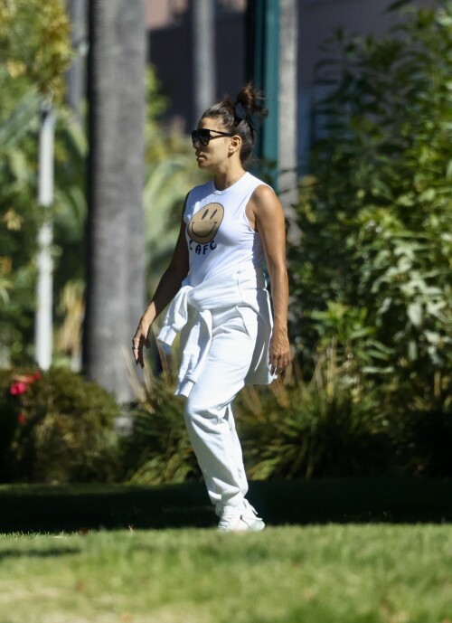 Eva Longoria | Spotted at the Park in Los Angeles - August 27, 2023

Eva Longoria enjoys some quality time with her husband and José Bastón and son Santiago, five, at the park in LA

Eva Longoria looked relaxed as she spent some time with her family in Los Angeles.

The actress, 48, who mixed and mingled at a charity function with Kim Kardashian and other celebrities on Saturday night, showcased her toned arms in a sleeveless white T-shirt with a smiley face and the initials LAFC.

The Flamin' Hot director completed her look with a pair of white jeans and sneakers.

She tied a white sweatshirt around her waist.

The Land of Women star wore her long, dark hair in a high bun and appeared to be wearing natural looking makeup.

She completed the look with a pair of dark sunglasses.

The Unplugging actress was joined by her husband, Jose Baston, 55, who looked dapper in a black sweater, joggers and sneakers.

The hem of a white T-shirt peaked beneath his sweater.

Their son, Santiago, five, looked adorable in a sky blue golf shirt and shorts.

On Sunday morning, Eva flaunted her toned curves in a jaw dropping swimsuit shot on social media.

The Texas-born beauty wore a canary yellow one-piece with a plunging halter top and French cut legs as she strolled along the beach carrying a wine glass.

She donned a yellow cover up and allowed the wind to tousle her dark locks for the shot.

The savvy businesswoman typed 'My summer secrets?' in yellow across the snap and then provided a link to the Instagram account for InMode Aesthetics.

The company provides high end skin care and treatments that include micro needling, laser treatments and other procedures.

In addition to supporting the This is About Humanity organization, which focuses on reuniting families who have been separated at the US-Mexico border, Ava has spent some of her time helping to raise money for survivors of the Maui fires.

The Casa Del Sol Tequila founder poured drinks Friday at a fundraiser in Santa Monica with proceeds going to helping Maui residents.

'What a night!' she wrote on Instagram next to a highlight video.

'I love anything that supports a good cause.'

DailyMail

#EvaLongoria