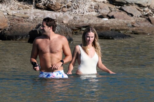 Margot Robbie | Sexy in a Swimsuit at a Beach in Greece - August 2023

Fans praise Margot Robbie for her 'au naturel' look as she goes for a dip in Greece with husband TomMargot Robbie's fans praised her 'au naturel' look on Tuesday as she enjoyed a relaxing beach day with her husband Tom Ackerley in Greece.

The Australian actress, 33, looked effortlessly stunning as she showed off her youthful visage and figure in a high-cut white one-piece while going for a swim.

She was flooded with comments from her loyal followers who applauded her for maintaining her natural beauty.

'Impressive, flawless and natural, that is what a star with class wears the correct bathing suit. No silicone, Botox or padding,' one person said.

Another said: 'Wow... you can actually see frown lines when she squints which means no Botox....how refreshing.'

'My God, she is naturally beautiful,' a third agreed.

Another person commented: 'She looks lovely, she is talented and hard working and seems to have a very happy private life.'

'At last a picture of a natural born beauty. So wonderfully refreshing,' one wrote.

Robbie's European vacation comes after she is reportedly set to make $50 million in salary and bonuses from her new movie Barbie that saw her play the titular character in the Greta Gerwig-directed project.

She will taking home the whopping pay check, having also produced the film through her production company, LuckyChap Entertainment, Variety reported earlier this month, citing three individuals with knowledge of her deal.

LuckyChap - which Robbie founded in 2014 with Ackerley, and friends Josey McNamara and Sophia Kerr - has also produced Promising Young Woman, Birds Of Prey and series Maid.

Gerwig is also likely to receive bonuses due to the incredible success of Barbie.

The filmmaker made history, flying past more than $1 billion in worldwide box office gross, becoming the first movie directed solely by a woman to do so.

The film, based off the beloved Mattel character, is co-written by the director with longtime partner Noah Baumbach.

DailyMail

#MargotRobbie