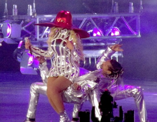 Beyonce | Debuts more new looks on her second night of performing in Las Vegas - August 27, 2023

Beyonce slips into a low-cut ruby red leotard with sheer opera gloves to light up the stage during her tour stop in Las Vegas

Beyonce's Las Vegas audience on Sunday evening hit the jackpot.

The iconic singer wore a show-stopping red dress that made her look her very best.

The 41-year-old crooner showed off the eye-popping look to her Instagram followers of more than 300million on Monday morning.

In a 10-slide post, Beyonce modeled the stunning red sequined outfit, which featured matching red tights as well as sheer gloves that extended to her toned biceps.

It was capped off with a red, ruffled backsplash that functioned as an elaborate, peacock-like cape of sorts.

The bedazzled number was reminiscent of Dorothy’s ruby slippers from The Wizard of Oz, and in keeping with that comparison, the singer wore red heels.

The Texas native showed no signs of slowing down, and her red outfit was a far cry from the outfits she wore at her Saturday show, where the hazel-eyed star dressed in a white feather coat and, in another look, a black PVC bodysuit that stood out against her honey-blonde locks, which were parted down the middle.

Diamond bracelets adorned Beyonce’s wrists and ankles on Sunday, and the 32-time Grammy winner also wore diamond earrings that framed her flawless face.

Her ring finger also twinkled onstage, and she has been married to rapper-turned-mogul Jay-Z, 53, since 2008.

They have three children — Blue Ivy, 11, and fraternal twins Rumi and Sir, six, and the couple has also amassed a $3billion fortune together.

Beyonce has been posting photos from her tour on Instagram, where she boasts 316 million followers.

She arrived in Vegas after serenading Phoenix, Arizona, and this coming weekend, she’ll be in Los Angeles, singing for countless Hollywood A-listers who can afford a ticket.

On Sunday night, she rose from the stage like a magnificent phoenix — and what a stage it was. The singer clearly spared no expense when it came to the tour’s production design, and she had the crowd eating out of the palm of her hand.

As usual, Beyonce did not caption her posts or tag any of the designers, preferring to keep the focus on her epic performance. The entire tour - Beyonce's ninth - is projected to take in approximately $300 million, according to Billboard.

Beyonce’s tour kicked off on May 10 in Stockholm, Sweden, where she played for a sold-out crowd of more than 90,000, though that was nothing compared to the audience for her London show. More than 240,000 people turned out to Tottenham Hotspur Stadium earlier this summer before the tour embarked on its Western European leg.

Following two terrific nights in Toronto, Beyonce returned to the U.S., where she blew the lid off of Soldier Field in Chicago and MetLife Stadium in New Jersey.

After stopping off for a three-night stint in Los Angeles, Beyonce will perform six more shows, ending the tour in Kansas City on Oct. 1. She also had to cancel a concert in Pittsburgh on Aug. 3 due to logistic and production issues.

In addition to being one of the greatest singers of all time, Beyonce is also an accomplished actress whose credits include Dreamgirls, The Lion King, The Pink Panther, Cadillac Records, Austin Powers in Goldmember, and the future cult classic Obsessed.

She has also directed the visual albums Lemonade and Black Is King, as well as the concert documentary film Homecoming.

Beyonce also earned an Oscar nomination for co-writing the song Be Alive for the movie King Richard, in which Will Smith played the father of Venus and Serena Williams.

The Renaissance World Tour follows the Dangerously in Love Tour (2003), The Beyonce Experience (2007), the I Am… Tour (2009-2010), The Mrs. Carter Show World Tour (2013-2014), and The Formation World Tour (2016).

The show is two and a half hours long and split into six acts, and the sold-out tour is already the highest-grossing tour by a Black artist in history, boosting the local economy wherever it touches down.

Accordingly, Beyonce has been donating scholarships worth $1 million to students in colleges and universities located in cities along the tour.

DailyMail

#Beyonce