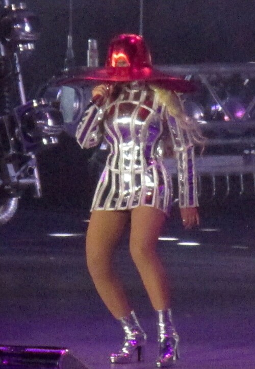 Beyonce | Debuts more new looks on her second night of performing in Las Vegas - August 27, 2023

Beyonce slips into a low-cut ruby red leotard with sheer opera gloves to light up the stage during her tour stop in Las Vegas

Beyonce's Las Vegas audience on Sunday evening hit the jackpot.

The iconic singer wore a show-stopping red dress that made her look her very best.

The 41-year-old crooner showed off the eye-popping look to her Instagram followers of more than 300million on Monday morning.

In a 10-slide post, Beyonce modeled the stunning red sequined outfit, which featured matching red tights as well as sheer gloves that extended to her toned biceps.

It was capped off with a red, ruffled backsplash that functioned as an elaborate, peacock-like cape of sorts.

The bedazzled number was reminiscent of Dorothy’s ruby slippers from The Wizard of Oz, and in keeping with that comparison, the singer wore red heels.

The Texas native showed no signs of slowing down, and her red outfit was a far cry from the outfits she wore at her Saturday show, where the hazel-eyed star dressed in a white feather coat and, in another look, a black PVC bodysuit that stood out against her honey-blonde locks, which were parted down the middle.

Diamond bracelets adorned Beyonce’s wrists and ankles on Sunday, and the 32-time Grammy winner also wore diamond earrings that framed her flawless face.

Her ring finger also twinkled onstage, and she has been married to rapper-turned-mogul Jay-Z, 53, since 2008.

They have three children — Blue Ivy, 11, and fraternal twins Rumi and Sir, six, and the couple has also amassed a $3billion fortune together.

Beyonce has been posting photos from her tour on Instagram, where she boasts 316 million followers.

She arrived in Vegas after serenading Phoenix, Arizona, and this coming weekend, she’ll be in Los Angeles, singing for countless Hollywood A-listers who can afford a ticket.

On Sunday night, she rose from the stage like a magnificent phoenix — and what a stage it was. The singer clearly spared no expense when it came to the tour’s production design, and she had the crowd eating out of the palm of her hand.

As usual, Beyonce did not caption her posts or tag any of the designers, preferring to keep the focus on her epic performance. The entire tour - Beyonce's ninth - is projected to take in approximately $300 million, according to Billboard.

Beyonce’s tour kicked off on May 10 in Stockholm, Sweden, where she played for a sold-out crowd of more than 90,000, though that was nothing compared to the audience for her London show. More than 240,000 people turned out to Tottenham Hotspur Stadium earlier this summer before the tour embarked on its Western European leg.

Following two terrific nights in Toronto, Beyonce returned to the U.S., where she blew the lid off of Soldier Field in Chicago and MetLife Stadium in New Jersey.

After stopping off for a three-night stint in Los Angeles, Beyonce will perform six more shows, ending the tour in Kansas City on Oct. 1. She also had to cancel a concert in Pittsburgh on Aug. 3 due to logistic and production issues.

In addition to being one of the greatest singers of all time, Beyonce is also an accomplished actress whose credits include Dreamgirls, The Lion King, The Pink Panther, Cadillac Records, Austin Powers in Goldmember, and the future cult classic Obsessed.

She has also directed the visual albums Lemonade and Black Is King, as well as the concert documentary film Homecoming.

Beyonce also earned an Oscar nomination for co-writing the song Be Alive for the movie King Richard, in which Will Smith played the father of Venus and Serena Williams.

The Renaissance World Tour follows the Dangerously in Love Tour (2003), The Beyonce Experience (2007), the I Am… Tour (2009-2010), The Mrs. Carter Show World Tour (2013-2014), and The Formation World Tour (2016).

The show is two and a half hours long and split into six acts, and the sold-out tour is already the highest-grossing tour by a Black artist in history, boosting the local economy wherever it touches down.

Accordingly, Beyonce has been donating scholarships worth $1 million to students in colleges and universities located in cities along the tour.

DailyMail

#Beyonce