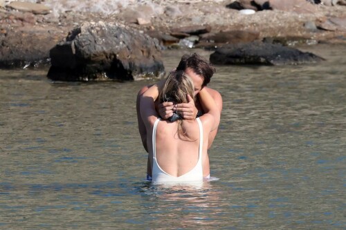 Margot Robbie | Sexy in a Swimsuit at a Beach in Greece - August 2023

Fans praise Margot Robbie for her 'au naturel' look as she goes for a dip in Greece with husband TomMargot Robbie's fans praised her 'au naturel' look on Tuesday as she enjoyed a relaxing beach day with her husband Tom Ackerley in Greece.

The Australian actress, 33, looked effortlessly stunning as she showed off her youthful visage and figure in a high-cut white one-piece while going for a swim.

She was flooded with comments from her loyal followers who applauded her for maintaining her natural beauty.

'Impressive, flawless and natural, that is what a star with class wears the correct bathing suit. No silicone, Botox or padding,' one person said.

Another said: 'Wow... you can actually see frown lines when she squints which means no Botox....how refreshing.'

'My God, she is naturally beautiful,' a third agreed.

Another person commented: 'She looks lovely, she is talented and hard working and seems to have a very happy private life.'

'At last a picture of a natural born beauty. So wonderfully refreshing,' one wrote.

Robbie's European vacation comes after she is reportedly set to make $50 million in salary and bonuses from her new movie Barbie that saw her play the titular character in the Greta Gerwig-directed project.

She will taking home the whopping pay check, having also produced the film through her production company, LuckyChap Entertainment, Variety reported earlier this month, citing three individuals with knowledge of her deal.

LuckyChap - which Robbie founded in 2014 with Ackerley, and friends Josey McNamara and Sophia Kerr - has also produced Promising Young Woman, Birds Of Prey and series Maid.

Gerwig is also likely to receive bonuses due to the incredible success of Barbie.

The filmmaker made history, flying past more than $1 billion in worldwide box office gross, becoming the first movie directed solely by a woman to do so.

The film, based off the beloved Mattel character, is co-written by the director with longtime partner Noah Baumbach.

DailyMail

#MargotRobbie