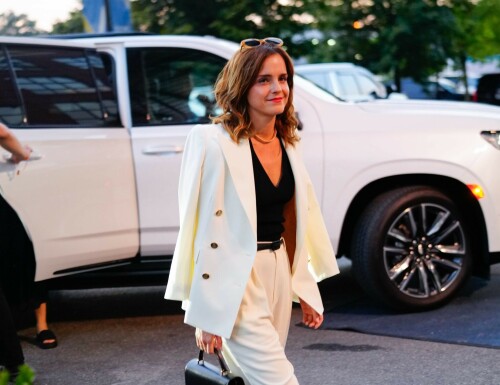 Emma Watson attends the 2023 US Open Tennis Championships in NY - September 5, 2023

Emma Watson weaves her magic on Anna Wintour! Spellbinding Harry Potter star makes Vogue boss crack a rare smile at the 2023 US Open Tennis Championships in New York City

Emma Watson served up a chic look for the 2023 US Open Tennis Championships in New York City on Tuesday.

The 33-year-old cut a seriously stylish figure in an eye-catching white suit and black vest while watching Karolina Muchova of the Czech Republic defeat Sorana Cirstea, of Romania, during the quarterfinals.

And it's a good thing the Harry Potter star brought her fashion A-game - she was seated alongside Vogue boss Anna Wintour.

The actress certainly managed to weave her magic on the notoriously aloof magazine icon, with Wintour cracking a rare smile and even a chuckle while the pair chatted away courtside.

Of course, the pair have crossed paths many times before with Emma chalking up numerous British Vogue and international Vogue covers during her hugely successful career.

The 73-year-old media executive donned an eye-catching white-and-green sleeved dress at the sporting event.

The longtime Editor-In-Chief of Vogue added another element of brightness to her look with a white leather belt.

The fashion industry mainstay also accessorized with a set of sparkling necklaces.

Wintour donned a pair of jet-black sunglasses, which contrasted perfectly with the bright tones of her clothing.

Her platinum blonde hair fell towards her shoulders while she spent time at the tournament.

Elsewhere at the star-studded event, Chloe Grace Moretz opted for a graphic-printed navy blue t-shirt during the championships.

The 26-year-old performer paired her top with a set of wide-framed sunglasses.

The Dark Shadows actress gave her outfit a bit of metallic shine with a set of earrings.

Moretz was also seated next to her girlfriend, Kate Harrison, for the duration of the sporting event.

The 32-year-old model showed off her sculpted arms while wearing a white undershirt.

The social media personality added an element of darkness to her look with a black crossbody bag.

Her dark brunette hair cascaded onto her shoulders and chest as she spent time at the tournament.

J Balvin stood out while wearing a bright pink polo shirt during the annual sporting event.

The 38-year-old musician paired his top with an equally eye-catching pair of pants.

DailyMail

#EmmaWatson