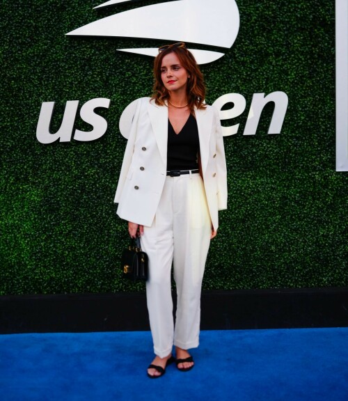 Emma Watson attends the 2023 US Open Tennis Championships in NY - September 5, 2023

Emma Watson weaves her magic on Anna Wintour! Spellbinding Harry Potter star makes Vogue boss crack a rare smile at the 2023 US Open Tennis Championships in New York City

Emma Watson served up a chic look for the 2023 US Open Tennis Championships in New York City on Tuesday.

The 33-year-old cut a seriously stylish figure in an eye-catching white suit and black vest while watching Karolina Muchova of the Czech Republic defeat Sorana Cirstea, of Romania, during the quarterfinals.

And it's a good thing the Harry Potter star brought her fashion A-game - she was seated alongside Vogue boss Anna Wintour.

The actress certainly managed to weave her magic on the notoriously aloof magazine icon, with Wintour cracking a rare smile and even a chuckle while the pair chatted away courtside.

Of course, the pair have crossed paths many times before with Emma chalking up numerous British Vogue and international Vogue covers during her hugely successful career.

The 73-year-old media executive donned an eye-catching white-and-green sleeved dress at the sporting event.

The longtime Editor-In-Chief of Vogue added another element of brightness to her look with a white leather belt.

The fashion industry mainstay also accessorized with a set of sparkling necklaces.

Wintour donned a pair of jet-black sunglasses, which contrasted perfectly with the bright tones of her clothing.

Her platinum blonde hair fell towards her shoulders while she spent time at the tournament.

Elsewhere at the star-studded event, Chloe Grace Moretz opted for a graphic-printed navy blue t-shirt during the championships.

The 26-year-old performer paired her top with a set of wide-framed sunglasses.

The Dark Shadows actress gave her outfit a bit of metallic shine with a set of earrings.

Moretz was also seated next to her girlfriend, Kate Harrison, for the duration of the sporting event.

The 32-year-old model showed off her sculpted arms while wearing a white undershirt.

The social media personality added an element of darkness to her look with a black crossbody bag.

Her dark brunette hair cascaded onto her shoulders and chest as she spent time at the tournament.

J Balvin stood out while wearing a bright pink polo shirt during the annual sporting event.

The 38-year-old musician paired his top with an equally eye-catching pair of pants.

DailyMail

#EmmaWatson