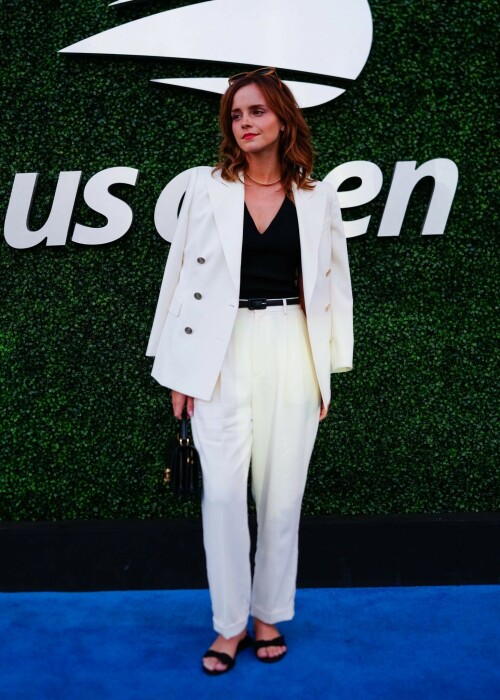 Emma Watson attends the 2023 US Open Tennis Championships in NY - September 5, 2023

Emma Watson weaves her magic on Anna Wintour! Spellbinding Harry Potter star makes Vogue boss crack a rare smile at the 2023 US Open Tennis Championships in New York City

Emma Watson served up a chic look for the 2023 US Open Tennis Championships in New York City on Tuesday.

The 33-year-old cut a seriously stylish figure in an eye-catching white suit and black vest while watching Karolina Muchova of the Czech Republic defeat Sorana Cirstea, of Romania, during the quarterfinals.

And it's a good thing the Harry Potter star brought her fashion A-game - she was seated alongside Vogue boss Anna Wintour.

The actress certainly managed to weave her magic on the notoriously aloof magazine icon, with Wintour cracking a rare smile and even a chuckle while the pair chatted away courtside.

Of course, the pair have crossed paths many times before with Emma chalking up numerous British Vogue and international Vogue covers during her hugely successful career.

The 73-year-old media executive donned an eye-catching white-and-green sleeved dress at the sporting event.

The longtime Editor-In-Chief of Vogue added another element of brightness to her look with a white leather belt.

The fashion industry mainstay also accessorized with a set of sparkling necklaces.

Wintour donned a pair of jet-black sunglasses, which contrasted perfectly with the bright tones of her clothing.

Her platinum blonde hair fell towards her shoulders while she spent time at the tournament.

Elsewhere at the star-studded event, Chloe Grace Moretz opted for a graphic-printed navy blue t-shirt during the championships.

The 26-year-old performer paired her top with a set of wide-framed sunglasses.

The Dark Shadows actress gave her outfit a bit of metallic shine with a set of earrings.

Moretz was also seated next to her girlfriend, Kate Harrison, for the duration of the sporting event.

The 32-year-old model showed off her sculpted arms while wearing a white undershirt.

The social media personality added an element of darkness to her look with a black crossbody bag.

Her dark brunette hair cascaded onto her shoulders and chest as she spent time at the tournament.

J Balvin stood out while wearing a bright pink polo shirt during the annual sporting event.

The 38-year-old musician paired his top with an equally eye-catching pair of pants.

DailyMail

#EmmaWatson