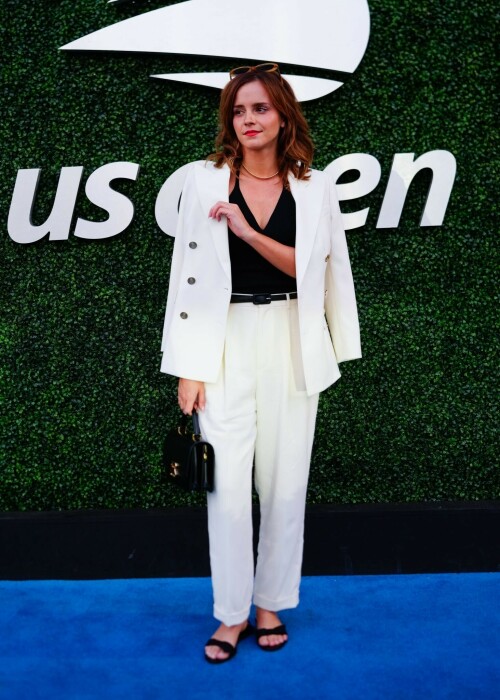 Emma Watson attends the 2023 US Open Tennis Championships in NY - September 5, 2023

Emma Watson weaves her magic on Anna Wintour! Spellbinding Harry Potter star makes Vogue boss crack a rare smile at the 2023 US Open Tennis Championships in New York City

Emma Watson served up a chic look for the 2023 US Open Tennis Championships in New York City on Tuesday.

The 33-year-old cut a seriously stylish figure in an eye-catching white suit and black vest while watching Karolina Muchova of the Czech Republic defeat Sorana Cirstea, of Romania, during the quarterfinals.

And it's a good thing the Harry Potter star brought her fashion A-game - she was seated alongside Vogue boss Anna Wintour.

The actress certainly managed to weave her magic on the notoriously aloof magazine icon, with Wintour cracking a rare smile and even a chuckle while the pair chatted away courtside.

Of course, the pair have crossed paths many times before with Emma chalking up numerous British Vogue and international Vogue covers during her hugely successful career.

The 73-year-old media executive donned an eye-catching white-and-green sleeved dress at the sporting event.

The longtime Editor-In-Chief of Vogue added another element of brightness to her look with a white leather belt.

The fashion industry mainstay also accessorized with a set of sparkling necklaces.

Wintour donned a pair of jet-black sunglasses, which contrasted perfectly with the bright tones of her clothing.

Her platinum blonde hair fell towards her shoulders while she spent time at the tournament.

Elsewhere at the star-studded event, Chloe Grace Moretz opted for a graphic-printed navy blue t-shirt during the championships.

The 26-year-old performer paired her top with a set of wide-framed sunglasses.

The Dark Shadows actress gave her outfit a bit of metallic shine with a set of earrings.

Moretz was also seated next to her girlfriend, Kate Harrison, for the duration of the sporting event.

The 32-year-old model showed off her sculpted arms while wearing a white undershirt.

The social media personality added an element of darkness to her look with a black crossbody bag.

Her dark brunette hair cascaded onto her shoulders and chest as she spent time at the tournament.

J Balvin stood out while wearing a bright pink polo shirt during the annual sporting event.

The 38-year-old musician paired his top with an equally eye-catching pair of pants.

DailyMail

#EmmaWatson