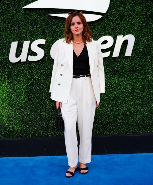 Emma Watson attends the 2023 US Open Tennis Championships in NY - September 5, 2023

Emma Watson weaves her magic on Anna Wintour! Spellbinding Harry Potter star makes Vogue boss crack a rare smile at the 2023 US Open Tennis Championships in New York City

Emma Watson served up a chic look for the 2023 US Open Tennis Championships in New York City on Tuesday.

The 33-year-old cut a seriously stylish figure in an eye-catching white suit and black vest while watching Karolina Muchova of the Czech Republic defeat Sorana Cirstea, of Romania, during the quarterfinals.

And it's a good thing the Harry Potter star brought her fashion A-game - she was seated alongside Vogue boss Anna Wintour.

The actress certainly managed to weave her magic on the notoriously aloof magazine icon, with Wintour cracking a rare smile and even a chuckle while the pair chatted away courtside.

Of course, the pair have crossed paths many times before with Emma chalking up numerous British Vogue and international Vogue covers during her hugely successful career.

The 73-year-old media executive donned an eye-catching white-and-green sleeved dress at the sporting event.

The longtime Editor-In-Chief of Vogue added another element of brightness to her look with a white leather belt.

The fashion industry mainstay also accessorized with a set of sparkling necklaces.

Wintour donned a pair of jet-black sunglasses, which contrasted perfectly with the bright tones of her clothing.

Her platinum blonde hair fell towards her shoulders while she spent time at the tournament.

Elsewhere at the star-studded event, Chloe Grace Moretz opted for a graphic-printed navy blue t-shirt during the championships.

The 26-year-old performer paired her top with a set of wide-framed sunglasses.

The Dark Shadows actress gave her outfit a bit of metallic shine with a set of earrings.

Moretz was also seated next to her girlfriend, Kate Harrison, for the duration of the sporting event.

The 32-year-old model showed off her sculpted arms while wearing a white undershirt.

The social media personality added an element of darkness to her look with a black crossbody bag.

Her dark brunette hair cascaded onto her shoulders and chest as she spent time at the tournament.

J Balvin stood out while wearing a bright pink polo shirt during the annual sporting event.

The 38-year-old musician paired his top with an equally eye-catching pair of pants.

DailyMail

#EmmaWatson