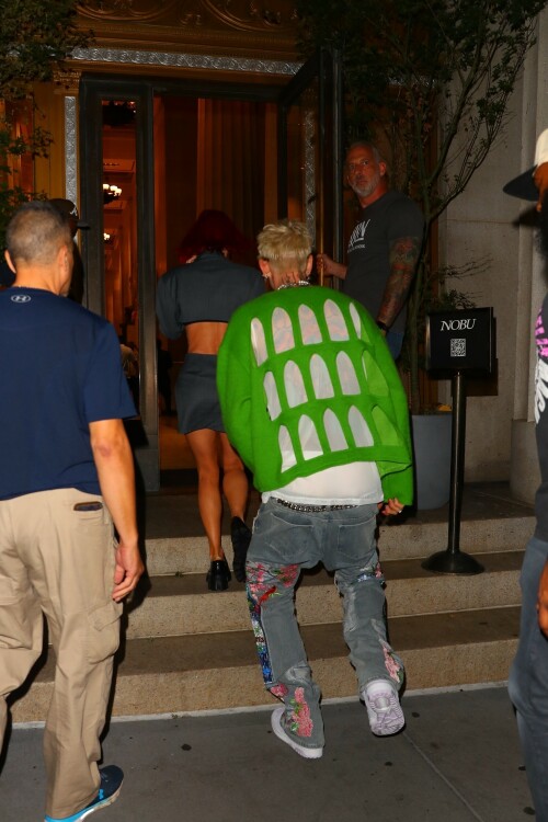 Megan Fox & Machine Gun Kelly arriving at the Nobu restaurant in New York City - September 6, 2023

Megan Fox & Machine Gun Kelly Show Off Their Bold Styles While Out in NYC

Megan Fox and Machine Gun Kelly are taking New York City by storm.

The 37-year-old Jennifer’s Body actress and the 33-year-old “bloody valentine” singer held hands as they left their hotel and headed to lunch on Wednesday afternoon (September 6) in New York City.

For their lunch outing, Megan wore an oversized gray blazer with knee-high snakeskin boots while MGK wore a puffy denim outfit.

Later that night, Megan showed off some skin in a cutoff blazer-dress while MGK wore a green cutout sweater as they headed to Nobu for dinner.

If you missed it, Megan recently announced plans to unveil a new project – a book of poetry. You can also see her in action in some new content from a forthcoming blockbuster!

JustJared

#MeganFox