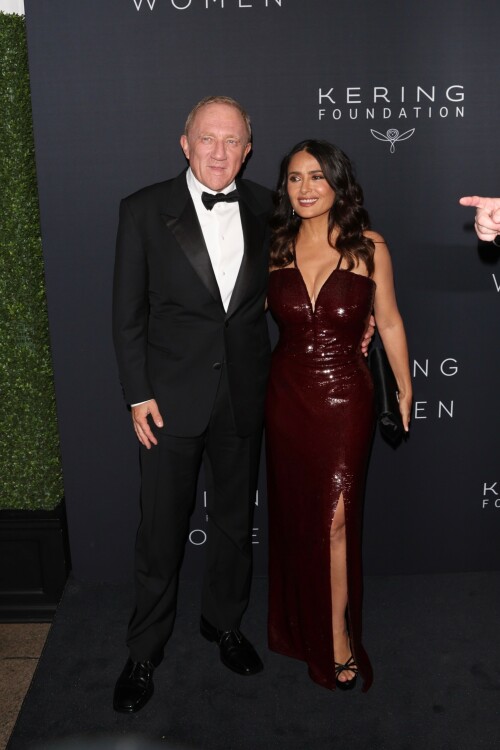 Salma Hayek - Kering Hosts 2nd Annual Caring for Women in New York - September 12, 2023

Salma Hayek oozes glamour in a plunging sequinned burgundy gown as she attends the Caring For Women charity dinner

Salma Hayek was sure to turn heads as she put on a very glamorous display at the Kering Foundation's second annual Caring For Women Dinner in New York on Tuesday, held to raise money for domestic abuse survivors.

The actress, 57, dazzled in a plunging sequinned burgundy gown as she graced the black carpet at the charity gala held to raise money for domestic abuse survivors. 

Salma was sure to look her best for the star-studded event, as she posed this way and that in the figure-hugging dress which featured a split at the leg.

The Frida star accessorised her glam look with black heels and a coordinating clutch bag, finishing things off with silver drop earrings. 

Salma was in good company as she posed alongside longtime husband and Kering CEO François-Henri Pinault, 61, who looked dapper in a black suit.

Pinault is chairman of the Kering Foundation and his wife Hayek is on the board of directors.

The second annual Caring For Women dinner is presented by the Kering Foundation — the leading foundation combatting the epidemic that is violence against women and girls.

It is a celebration of the charitable organization's 15th anniversary and the theme of the evening was 'strength in numbers,' as per WWD.

Hayek and Pinault co-chaired the event with the likes of supermodel Christy Turlington, Olivia Wilde and Zoe Kravitz among others.

This year's star-studded dinner benefitted organizations that 'address gender-based violence.'

'Despite alarming setbacks in women's rights around the world, there has been heartening progress to address violence against women in the last 15 years, and we must continue to harness the power of collaboration and solidarity to ensure that all women can lead fulfilling lives free from violence,' Pinault said in a statement head of Tuesday's soiree.

Salma's outing comes days after she proved age is just a number while showcasing her age-defying figure in a black and white patterned bikini. 

In her latest Instagram post, the 57-year-old Oscar nominee looked nothing short of sensational in a flowy light blue cover-up as she cruised around on the ocean on a yacht.

As she posed, with windswept hair and a coy smile, the House of Gucci star placed one hand on her right hip and gave the camera her best smoldering stare. 

'What’s wrong with Sunday blues?' she captioned the photo, which received more than 351,695 likes in just six hours.

Her latest post comes after gushing to fans that she is 'so happy to be alive and so profoundly grateful for all the blessings.'

'My beloved family, my precious friends, my health, my work that keeps me going, my empowering team, my relationship with animals & nature, and the love of all my loyal fans,' she captioned a sexy slideshow of snaps of her at the beach. 

She concluded: 'Happy 57th birthday to me!!!'

DailyMail

#SalmaHayek