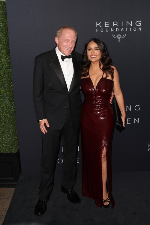 Salma Hayek - Kering Hosts 2nd Annual Caring for Women in New York - September 12, 2023

Salma Hayek oozes glamour in a plunging sequinned burgundy gown as she attends the Caring For Women charity dinner

Salma Hayek was sure to turn heads as she put on a very glamorous display at the Kering Foundation's second annual Caring For Women Dinner in New York on Tuesday, held to raise money for domestic abuse survivors.

The actress, 57, dazzled in a plunging sequinned burgundy gown as she graced the black carpet at the charity gala held to raise money for domestic abuse survivors.

Salma was sure to look her best for the star-studded event, as she posed this way and that in the figure-hugging dress which featured a split at the leg.

The Frida star accessorised her glam look with black heels and a coordinating clutch bag, finishing things off with silver drop earrings.

Salma was in good company as she posed alongside longtime husband and Kering CEO François-Henri Pinault, 61, who looked dapper in a black suit.

Pinault is chairman of the Kering Foundation and his wife Hayek is on the board of directors.

The second annual Caring For Women dinner is presented by the Kering Foundation — the leading foundation combatting the epidemic that is violence against women and girls.

It is a celebration of the charitable organization's 15th anniversary and the theme of the evening was 'strength in numbers,' as per WWD.

Hayek and Pinault co-chaired the event with the likes of supermodel Christy Turlington, Olivia Wilde and Zoe Kravitz among others.

This year's star-studded dinner benefitted organizations that 'address gender-based violence.'

'Despite alarming setbacks in women's rights around the world, there has been heartening progress to address violence against women in the last 15 years, and we must continue to harness the power of collaboration and solidarity to ensure that all women can lead fulfilling lives free from violence,' Pinault said in a statement head of Tuesday's soiree.

Salma's outing comes days after she proved age is just a number while showcasing her age-defying figure in a black and white patterned bikini.

In her latest Instagram post, the 57-year-old Oscar nominee looked nothing short of sensational in a flowy light blue cover-up as she cruised around on the ocean on a yacht.

As she posed, with windswept hair and a coy smile, the House of Gucci star placed one hand on her right hip and gave the camera her best smoldering stare.

'What’s wrong with Sunday blues?' she captioned the photo, which received more than 351,695 likes in just six hours.

Her latest post comes after gushing to fans that she is 'so happy to be alive and so profoundly grateful for all the blessings.'

'My beloved family, my precious friends, my health, my work that keeps me going, my empowering team, my relationship with animals & nature, and the love of all my loyal fans,' she captioned a sexy slideshow of snaps of her at the beach.

She concluded: 'Happy 57th birthday to me!!!'

DailyMail

#SalmaHayek