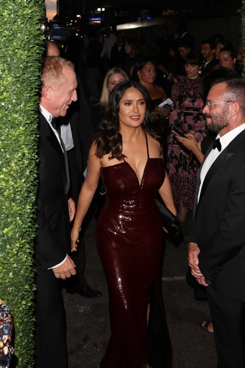 Salma Hayek - Kering Hosts 2nd Annual Caring for Women in New York - September 12, 2023

Salma Hayek oozes glamour in a plunging sequinned burgundy gown as she attends the Caring For Women charity dinner

Salma Hayek was sure to turn heads as she put on a very glamorous display at the Kering Foundation's second annual Caring For Women Dinner in New York on Tuesday, held to raise money for domestic abuse survivors.

The actress, 57, dazzled in a plunging sequinned burgundy gown as she graced the black carpet at the charity gala held to raise money for domestic abuse survivors. 

Salma was sure to look her best for the star-studded event, as she posed this way and that in the figure-hugging dress which featured a split at the leg.

The Frida star accessorised her glam look with black heels and a coordinating clutch bag, finishing things off with silver drop earrings. 

Salma was in good company as she posed alongside longtime husband and Kering CEO François-Henri Pinault, 61, who looked dapper in a black suit.

Pinault is chairman of the Kering Foundation and his wife Hayek is on the board of directors.

The second annual Caring For Women dinner is presented by the Kering Foundation — the leading foundation combatting the epidemic that is violence against women and girls.

It is a celebration of the charitable organization's 15th anniversary and the theme of the evening was 'strength in numbers,' as per WWD.

Hayek and Pinault co-chaired the event with the likes of supermodel Christy Turlington, Olivia Wilde and Zoe Kravitz among others.

This year's star-studded dinner benefitted organizations that 'address gender-based violence.'

'Despite alarming setbacks in women's rights around the world, there has been heartening progress to address violence against women in the last 15 years, and we must continue to harness the power of collaboration and solidarity to ensure that all women can lead fulfilling lives free from violence,' Pinault said in a statement head of Tuesday's soiree.

Salma's outing comes days after she proved age is just a number while showcasing her age-defying figure in a black and white patterned bikini. 

In her latest Instagram post, the 57-year-old Oscar nominee looked nothing short of sensational in a flowy light blue cover-up as she cruised around on the ocean on a yacht.

As she posed, with windswept hair and a coy smile, the House of Gucci star placed one hand on her right hip and gave the camera her best smoldering stare. 

'What’s wrong with Sunday blues?' she captioned the photo, which received more than 351,695 likes in just six hours.

Her latest post comes after gushing to fans that she is 'so happy to be alive and so profoundly grateful for all the blessings.'

'My beloved family, my precious friends, my health, my work that keeps me going, my empowering team, my relationship with animals & nature, and the love of all my loyal fans,' she captioned a sexy slideshow of snaps of her at the beach. 

She concluded: 'Happy 57th birthday to me!!!'

DailyMail

#SalmaHayek