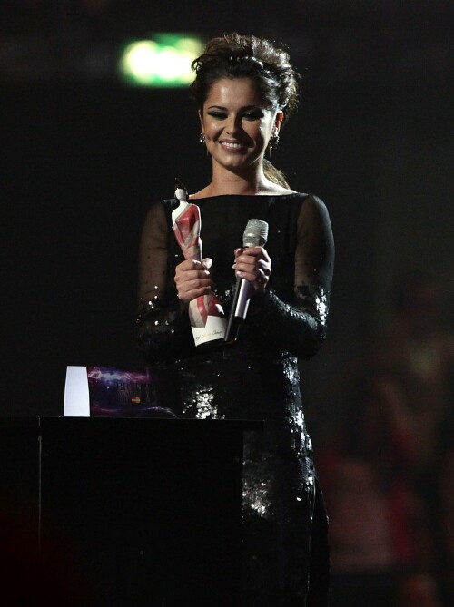 Cheryl Cole | Brit Awards, London - February 15, 2011

Cheryl Cole wears a black sparkly Stella McCartney dress to The Brit Awards 2011 held at The O2 Arena on Tuesday (February 15) in London, England.

The 27-year-old British singer presented Rihanna with the Best International Female Solo Artist award, saying: “And the winner of the Best International Female solo artist is, my girl crush, what’s her name? Rihanna.”

Cheryl attended the Elle Style Awards 2011 on Monday and is also on the cover of Elle UK’s February issue.

JustJared

#CherylCole