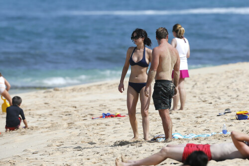 Jennifer Lawrence | On the beach in Hawaii - November 22, 2012

Jennifer Lawrence wearing Tory Burch Claire Bucket Bag, Burberry Be 4107 Sunglasses and Billabong Cloud Covera Skirt.

Jennifer Lawrence: Bikini After Thanksgiving in Hawaii

Jennifer Lawrence shows off her toned tummy in a navy bikini after Thanksgiving dinner with her brother Blaine on Thursday afternoon (November 22) in Maui, Hawaii.

The 22-year-old actress enjoyed a Thanksgiving meal with her whole family before hitting the sand, ahead of filming her upcoming movie, The Hunger Games: Catching Fire.

Just the day before, Jennifer was spotted with mom Karen for a laid-back stroll

And earlier in the week, Jennifer was in Los Angeles promoting her new film, Silver Linings Playbook.

JustJared

#JenniferLawrence