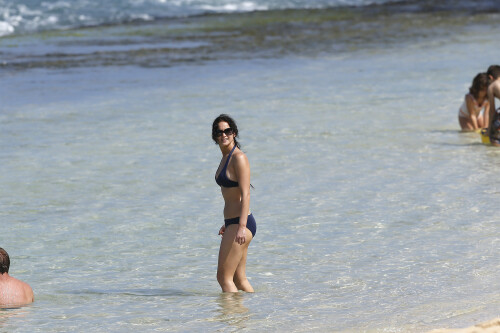 Jennifer Lawrence | On the beach in Hawaii - November 22, 2012

Jennifer Lawrence wearing Tory Burch Claire Bucket Bag, Burberry Be 4107 Sunglasses and Billabong Cloud Covera Skirt.

Jennifer Lawrence: Bikini After Thanksgiving in Hawaii

Jennifer Lawrence shows off her toned tummy in a navy bikini after Thanksgiving dinner with her brother Blaine on Thursday afternoon (November 22) in Maui, Hawaii.

The 22-year-old actress enjoyed a Thanksgiving meal with her whole family before hitting the sand, ahead of filming her upcoming movie, The Hunger Games: Catching Fire.

Just the day before, Jennifer was spotted with mom Karen for a laid-back stroll

And earlier in the week, Jennifer was in Los Angeles promoting her new film, Silver Linings Playbook.

JustJared

#JenniferLawrence