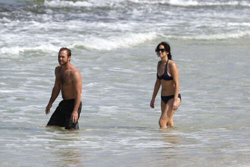 Jennifer Lawrence | On the beach in Hawaii - November 22, 2012

Jennifer Lawrence wearing Tory Burch Claire Bucket Bag, Burberry Be 4107 Sunglasses and Billabong Cloud Covera Skirt.

Jennifer Lawrence: Bikini After Thanksgiving in Hawaii

Jennifer Lawrence shows off her toned tummy in a navy bikini after Thanksgiving dinner with her brother Blaine on Thursday afternoon (November 22) in Maui, Hawaii.

The 22-year-old actress enjoyed a Thanksgiving meal with her whole family before hitting the sand, ahead of filming her upcoming movie, The Hunger Games: Catching Fire.

Just the day before, Jennifer was spotted with mom Karen for a laid-back stroll

And earlier in the week, Jennifer was in Los Angeles promoting her new film, Silver Linings Playbook.

JustJared

#JenniferLawrence