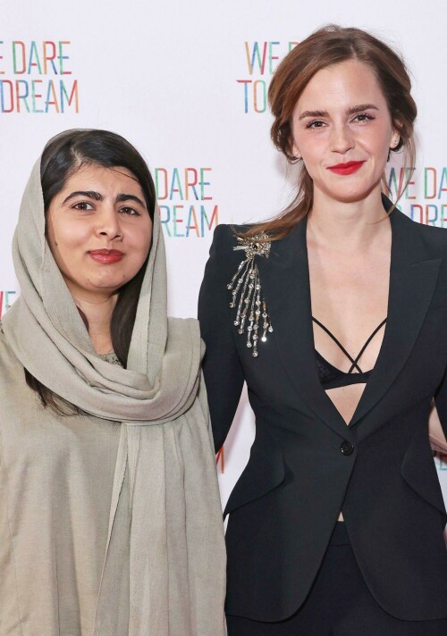 Emma Watson | 'We Dare to Dream' Premiere in London, UK - November 26, 2023

Emma Watson dazzles in a plunging black suit as she poses with Malala Yousafzai at the premiere of We Dare To Dream

Emma Watson dazzled in a plunging black suit at the We Dare To Dream premiere in London on Sunday evening.

The Harry Potter actress, 33, looked radiant as she joined Malala Yousafzai at the event at Cineworld Leicester Square.

Emma opted for an all-black number, flashing a black bralette under her suit, which was embellished with sequins at the shoulder.

The screen star also posed with the film's director Waad Al-Kateab and producer Joe Gebbia.

Also in attendance was Emma's Harry Potter co-star Jason Isaacs, who played Lucius Malfoy in the wizarding series.

Jason looked laid-back in a zip-up hoodie and jeans - but added a blazer for his evening out.

James Corden appeared in high spirits in a black blazer with red trimmings and buttons - after making the move from America back to the UK.

We Dare To Dream sees Refugee athletes face dramatic challenges while competing for a place in the 2020 Olympic Games.

The film features an original song Don't Need to Sleep performed by John Legend, while Angelina Jolie and Legend are two of the executive producers.

The athletes from Iran, Syria, South Sudan and Cameroon all seek to make it as they train to compete on the world stage, revealing a breadth of backgrounds, personal stories and Olympic sports.

It shows the fire and the drive of young people forced to leave their families, homes and countries of birth to build new lives out of nothing.

Culminating in their competition at the summer Olympics, their compatriots back home and their new communities in refugee camps watch as these determined young athletes fight for their place in the world.

Emma took some time out for the special evening from her busy studies at Oxford University, where she is currently focusing on master's degree in creative writing.

Her plans to study creative writing were revealed in an interview with the Financial Times in April, in which it was reported that she had begun writing poetry during lockdown as well as essays on love, friendship and relationships.

Her studies are thought to be part-time and mostly online.

However she caused a stir when she appeared in person for the university's matriculation ceremony at the start of the academic year, as students rushed to take photos of the famous star.

She also spent a year attending Worcester College at Oxford as an undergraduate in the 2011/12 academic year.

This was during the course of her English literature degree at Brown University in Rhode Island, from where she graduated in 2014.

The Oxford University website states that the creative writing master's course runs for two years and costs £9,025 a year for UK students and £14,155 a year for those from overseas.

Emma spent much of her childhood in Oxfordshire, living there with her mother Jacqueline from the age of five and attending Dragon School and Headington School in the city.

Daily Mail

#EmmaWatson