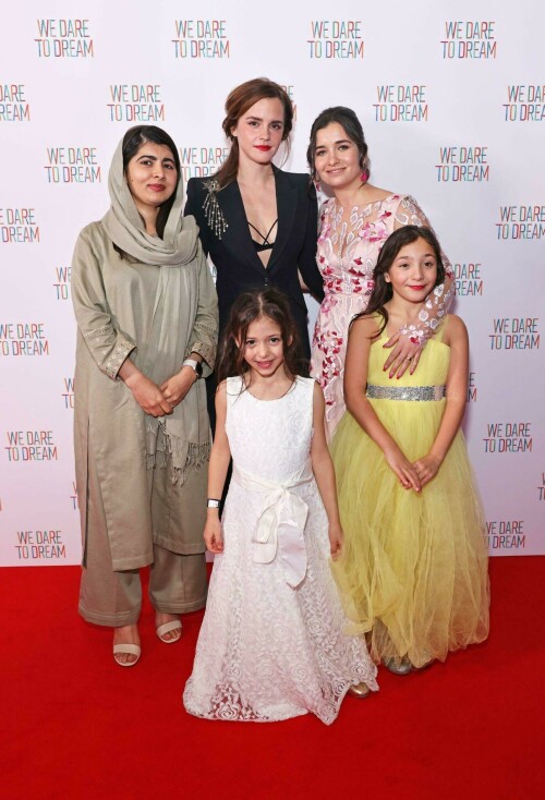 Emma Watson | 'We Dare to Dream' Premiere in London, UK - November 26, 2023

Emma Watson dazzles in a plunging black suit as she poses with Malala Yousafzai at the premiere of We Dare To Dream

Emma Watson dazzled in a plunging black suit at the We Dare To Dream premiere in London on Sunday evening.

The Harry Potter actress, 33, looked radiant as she joined Malala Yousafzai at the event at Cineworld Leicester Square.

Emma opted for an all-black number, flashing a black bralette under her suit, which was embellished with sequins at the shoulder.

The screen star also posed with the film's director Waad Al-Kateab and producer Joe Gebbia.

Also in attendance was Emma's Harry Potter co-star Jason Isaacs, who played Lucius Malfoy in the wizarding series.

Jason looked laid-back in a zip-up hoodie and jeans - but added a blazer for his evening out.

James Corden appeared in high spirits in a black blazer with red trimmings and buttons - after making the move from America back to the UK.

We Dare To Dream sees Refugee athletes face dramatic challenges while competing for a place in the 2020 Olympic Games.

The film features an original song Don't Need to Sleep performed by John Legend, while Angelina Jolie and Legend are two of the executive producers.

The athletes from Iran, Syria, South Sudan and Cameroon all seek to make it as they train to compete on the world stage, revealing a breadth of backgrounds, personal stories and Olympic sports.

It shows the fire and the drive of young people forced to leave their families, homes and countries of birth to build new lives out of nothing.

Culminating in their competition at the summer Olympics, their compatriots back home and their new communities in refugee camps watch as these determined young athletes fight for their place in the world.

Emma took some time out for the special evening from her busy studies at Oxford University, where she is currently focusing on master's degree in creative writing.

Her plans to study creative writing were revealed in an interview with the Financial Times in April, in which it was reported that she had begun writing poetry during lockdown as well as essays on love, friendship and relationships.

Her studies are thought to be part-time and mostly online.

However she caused a stir when she appeared in person for the university's matriculation ceremony at the start of the academic year, as students rushed to take photos of the famous star.

She also spent a year attending Worcester College at Oxford as an undergraduate in the 2011/12 academic year.

This was during the course of her English literature degree at Brown University in Rhode Island, from where she graduated in 2014.

The Oxford University website states that the creative writing master's course runs for two years and costs £9,025 a year for UK students and £14,155 a year for those from overseas.

Emma spent much of her childhood in Oxfordshire, living there with her mother Jacqueline from the age of five and attending Dragon School and Headington School in the city.

Daily Mail

#EmmaWatson