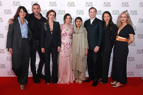 Emma Watson | 'We Dare to Dream' Premiere in London, UK - November 26, 2023

Emma Watson dazzles in a plunging black suit as she poses with Malala Yousafzai at the premiere of We Dare To Dream

Emma Watson dazzled in a plunging black suit at the We Dare To Dream premiere in London on Sunday evening.

The Harry Potter actress, 33, looked radiant as she joined Malala Yousafzai at the event at Cineworld Leicester Square.

Emma opted for an all-black number, flashing a black bralette under her suit, which was embellished with sequins at the shoulder.

The screen star also posed with the film's director Waad Al-Kateab and producer Joe Gebbia.

Also in attendance was Emma's Harry Potter co-star Jason Isaacs, who played Lucius Malfoy in the wizarding series.

Jason looked laid-back in a zip-up hoodie and jeans - but added a blazer for his evening out.

James Corden appeared in high spirits in a black blazer with red trimmings and buttons - after making the move from America back to the UK.

We Dare To Dream sees Refugee athletes face dramatic challenges while competing for a place in the 2020 Olympic Games.

The film features an original song Don't Need to Sleep performed by John Legend, while Angelina Jolie and Legend are two of the executive producers.

The athletes from Iran, Syria, South Sudan and Cameroon all seek to make it as they train to compete on the world stage, revealing a breadth of backgrounds, personal stories and Olympic sports.

It shows the fire and the drive of young people forced to leave their families, homes and countries of birth to build new lives out of nothing.

Culminating in their competition at the summer Olympics, their compatriots back home and their new communities in refugee camps watch as these determined young athletes fight for their place in the world.

Emma took some time out for the special evening from her busy studies at Oxford University, where she is currently focusing on master's degree in creative writing.

Her plans to study creative writing were revealed in an interview with the Financial Times in April, in which it was reported that she had begun writing poetry during lockdown as well as essays on love, friendship and relationships.

Her studies are thought to be part-time and mostly online.

However she caused a stir when she appeared in person for the university's matriculation ceremony at the start of the academic year, as students rushed to take photos of the famous star.

She also spent a year attending Worcester College at Oxford as an undergraduate in the 2011/12 academic year.

This was during the course of her English literature degree at Brown University in Rhode Island, from where she graduated in 2014.

The Oxford University website states that the creative writing master's course runs for two years and costs £9,025 a year for UK students and £14,155 a year for those from overseas.

Emma spent much of her childhood in Oxfordshire, living there with her mother Jacqueline from the age of five and attending Dragon School and Headington School in the city.

Daily Mail

#EmmaWatson