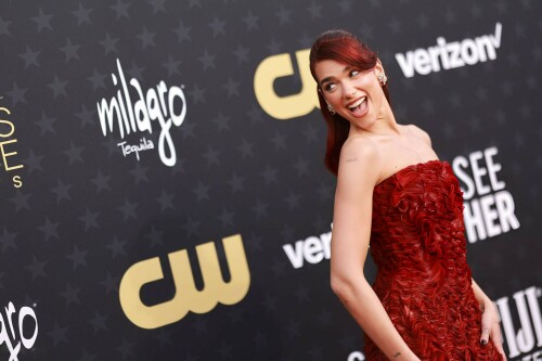 Dua Lipa | 29th Annual Critics Choice Awards In Santa Monica - 14.01.2024

Dua Lipa Dressed Like a Literal English Rose in a Red Floral Dress at the Critics Choice Awards

After making a bold sartorial statement at last weekend’s Golden Globes, Dua Lipa continued her award season fashion run at tonight’s Critics Choice Awards. Lipa is up for Best Song for Barbie’s “Dance the Night.” Barbie itself has 18 nominations at the ceremony, including for Best Acting Ensemble and Best Picture. Lipa played Mermaid Barbie in the film, making her part of that nominated group.

On the red carpet, Lipa leaned into a literal English rose aesthetic, wearing a red Prada column dress with floral detailing. She wore her red hair half up, half down. Lipa accessorized with Jean Schlumberger by Tiffany& Co. earrings.

Lipa’s outing tonight comes after the singer sparked dating rumors with actor Callum Turner. A source claimed to Page Six that Turner and Lipa are a couple. “It’s new, but they’re mad about each other,” that source alleged.

In December, Lipa spoke to Vanity Fair about the success of Barbie. “The thing is, Greta [Gerwig, the film’s director] just really defied all odds,” she said. “Nobody knew what to expect from the Barbie film and for it to be able to hit so many chords, from it being so fun and happy and funny, to then really hitting the heartstrings and touching on something really emotional and having you, especially as a woman, contemplate your place and what’s expected of you.”

She also reflected on the process of writing “Dance the Night” and what it taught her. “Because writing for film isn’t something that I’ve done before, that was when I realized the power of possibly being able to write lyrics like a score,” she said. “I can basically narrate a story, and narrate what’s happening in the scene, to really merge the two worlds together, the music and the movie. [The song] can be its own stand-alone thing, but also when together it’s 100 percent tailored for that very moment in the film.”

ELLE

#DuaLipa