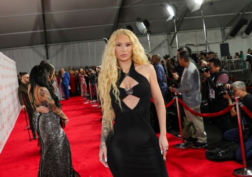 Iggy Azalea performs during 2024 Adult Video News Awards at Resorts World Las Vegas in Las Vegas - 27.01.2024

Iggy Azalea stuns in sleek black frock as she attends Adult Video News Awards in Las Vegas after quitting music career

Iggy Azalea cut a relatively modest figure as she attended a racy awards ceremony on Saturday night.

The Australian rapper, 33, stepped out for the 2024 Adult Video News Awards in Las Vegas, Nevada in a sleek black frock.

The dress featured peekaboo cutouts that flaunted a hint of bust and clung close to the performer's famous curves.

Iggy added a pair of nude high heels which matched her lip gloss and kept her accessories to a bracelet and a number of rings.

The blonde wore her long hair down in soft curls an opted for a clean makeup look with a peachy blush.

Iggy had earlier announced that she would be performing at the X-rated awards ceremony that celebrates the top performers in the porn industry.

'I'm thrilled to be performing at the AVN Awards—a celebration of passion, fearlessness, and artistic expression,' Iggy said in a statement.

'I can't wait to deliver a show that embodies the spirit of liberation and creative freedom. Let's make this an unforgettable night!'

It comes after Iggy quit the music industry, ten years after she shot to global fame with her song Fancy.

Iggy shared the shock announcement via X (formerly Twitter) earlier this month, penning a lengthy message to her fans about her plans to focus on other creative endeavours.

She also confirmed in her post she would no longer be finishing her upcoming fourth album.

'I know a lot of people have this idea that I was "bullied away from music" and that's something I've always laughed at because I'd never be bullied out of anything! In fact, I'm too stubborn,' Iggy began.

'I think I've even resisted changes within myself at times, purely because I don't like being viewed as someone who quits.'

Iggy, who recently announced she had come out of 'retirement' to pen a fourth album, said she now feels 'more passionately about design and creative direction' than she does about writing music.

'To many of you that's no shock to read. It shows in my work. Haha! Jokes aside, I do spend a lot more time on that part of things… because I'm most confident at that.'

'That's why I want to let you know that I'm not going to finish my album,' she continued.

Iggy said the album had been stalled in recent months while she was 'giving direction for a different project', and that she hasn't felt the 'urge' to get back to writing.

'I feel really happy and passionate in my day to day life when my mind's focused on that and so I want to stick to what's undeniably best for me,' she said.

The Mo Bounce hitmaker concluded by apologising to her fans, writing: 'I know for some fans this probably makes you feel a little deflated - I'm sorry to let you down.'

DailyMail

#IggyAzalea