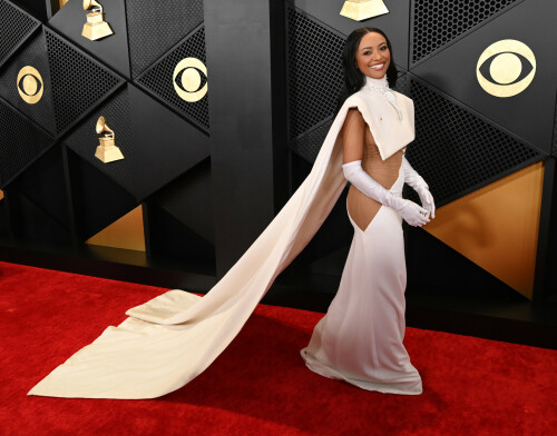 Kat Graham | 66th GRAMMY Awards at Crypto.com Arena in Los Angeles - 04.02.2024

Kat Graham Puts a Bold Spin on a Cape in Daring Gown at 2024 GRAMMYs

Kat Graham stood out from the crowd at the 2024 GRAMMYs.
For this year's GRAMMYs, Kat Graham was caped and ready. 

The performer stepped out on the red carpet outside the Crypto.com Arena on music's biggest night Sunday in a look that was sure to turn heads. The 34-year-old singer sported a sheer gown with a white skirt topped with a matching cape featuring a beaded ascot. Graham accessorized with matching white gloves and wore Sterling Forever earrings to complete the standout look. 

ET

6 HQ pics: http://kosty555.info/index.php?showtopic=304639

#KatGraham #Grammys