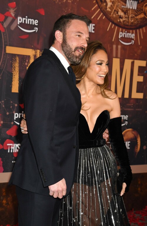 Jennifer Lopez | The Premiere of 'This Is Me…Now: A Love Story' at the Dolby Theater in Hollywood - 13.02.2024

Jennifer Lopez Wears a Sultry Sheer Zodiac Gown at This Is Me...Now: A Love Story Premiere

Lopez's Amazon original film will release in tandem with her new album 'This Is Me...Now'

Valentine's Day may be tomorrow, but Jennifer Lopez was joined by husband Ben Affleck at the premiere of her new film, This Is Me...Now: A Love Story on Tuesday.

Lopez, 54, wore an embellished black and silver strapless gown from Zuhair Murad’s Fall/Winter 2022 Couture Collection. The velvet bodice included a plunging V-neck that rested right above her waistline. She wore a pair of long, matching black velvet fingerless gloves that wrapped around her hands and ended right below her shoulders.

The dress' skirt was a voluminous A-line floor-length that included intricate embellishments of the different astrological signs. The sheer black skirt was segmented into each sign, with its corresponding animal and symbol embroidered at the hem.

She accessorized the look with a few chunky silver rings, a pair of knotted dangle drop earrings and a small black leather clutch. Her glam included a dark gray eyeshadow look, that was emphasized by her dark black eyeliner, and a peachy nude lipgloss. She finished the look with a soft and loose blow-out that she styled with a side part.

Lopez and Affleck, 51, arrived at L.A.'s Dolby Theatre for a glamorous date night in support of the singer's new onscreen project to launch on Amazon Prime Video Feb. 16 in tandem with her album, This Is Me... Now. According to a press release, fans can expect a “narrative-driven cinematic odyssey, steeped in mythological storytelling and personal healing."

This wouldn't be the first time the pair dressed up to support each other's career milestones. In March last year, Lopez stepped out in a two-toned dress, featuring a bejeweled top and neon skirt, to celebrate her husband's new movie Air.

The two also attended the 2024 Golden Globes, where the Michael Jordan-inspired film was nominated for best motion picture musical or comedy.

Lopez made a grand entrance in a pink strapless Nicole + Felicia couture strapless dress teamed with a matching cape with flower sleeves. Her accessories included dazzling Boucheron jewels, a Judith Leiber clutch and Christian Louboutin heels. Affleck looked dapper in a classic tuxedo topped with a bow tie.

In an interview with Variety's Marc Malkin on the carpet, Lopez opened up about her then-to-be-released wedding-themed music video for her new single "Can't Get Enough," which sparked a comment from Malkin about her four marriages.

Lopez was previously married to Ojani Noa, Chris Judd and Marc Anthony. She was engaged to Alex Rodriguez until March 2021, a month before they officially split.

She wed Affleck on July 16, 2022, after reigniting their old flame in 2021. They celebrated their union with an elaborate ceremony on Affleck's 87-acre compound in Georgia on Aug. 20, 2022.

Lopez wore three Ralph Lauren bridal gowns, including the ruffled mermaid dress (made with over 1,000 handkerchiefs!) she walked down the aisle in.

People

#JenniferLopez #JLo