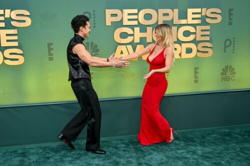 Sydney Sweeney | 2024 People's Choice Awards In Santa Monica - 18.02.2024

Sydney Sweeney Came in Hot to the 2024 People's Choice Awards in a Sexy Red Gown

During the ceremony, the 'Anyone But You' actress will take the stage to present one of the night's most coveted awards

Sydney Sweeney's style streak is officially red-hot!

The star, 26, arrived at the 2024 People's Choice Awards dazzling from every angle in a sleek Mônot dress in the "it" color of the season. Sweeney kept her glam on point with an effortless blowout and smoky eyes.

Sweeney is set to present during the ceremony. Additionally, she's in the running for comedy movie star of the year for her role in Anyone But You.

Earlier this week, the star dazzled at the Madame Web Los Angeles premiere, where she stepped out in a custom Oscar de la Renta strapless corset gown.

The bodice of Sweeney’s dramatic look featured an intricate "web" design woven into the structured top, which was accentuated by a nude underlay.

Sweeney stayed on theme with a black manicure, and she finished the look with an array of elegant silver rings on both hands.

Back in December, Sweeney was also in the headlines for her rep carpet look at the NYC premiere of her movie Anyone But You.

The actress turned heads in a Miu Miu embellished sheath gown. Sweeney's gown included rows of crystals dangling down and across the dress' entire translucent nude fabric.

The chic look was paired with Fred Leighton onyx and diamond pendant platinum earrings, a platinum twin old European cut diamond ring and a platinum oval rose cut diamond ring. She also accessorized the look with a black belt at her waist.

The look was completed with a soft glam makeup look that featured nude lipgloss, light nude shimmery eye shadow and a loose bun.

people

#SydneySweeney #PCAs