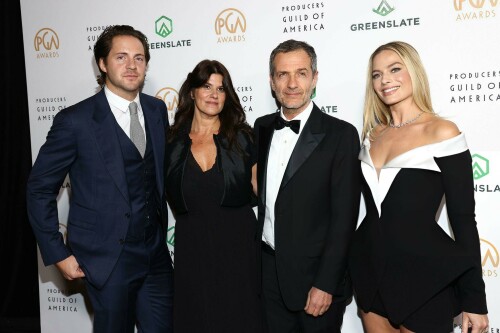 Margot Robbie | Producers Guild Awards in Hollywood - 25.02.2024

Margot Robbie leads glam arrivals in black minidress at the Producers Guild Awards

The event celebrated the crème de la crème of the film and television production industry

The 35th Annual Producers Guild Awards in Los Angeles was a star-studded affair, drawing an illustrious array of talent to its red carpet on Sunday. 

The event celebrated the crème de la crème of the film and television production industry, with nominees eagerly awaiting to see if their work would be honored.

Among the glamorous attendees was Margot Robbie, 33, who radiated elegance in a chic black and white mini dress that showcased her sculpted legs. 

The Barbie star's ensemble was perfectly complemented by a sparkling diamond necklace, adding a touch of glamour to her look. By her side was her equally stylish husband, Tom Ackerley, 33, who opted for a classic navy suit.

With the ceremony held at The Day Dolby Ballroom at Hollywood and Highland on February 25, the event was a testament to the guild's role in honoring excellence in production across film, television, and more.

Special honors this year included Tom Cruise receiving the David O. Selznick Achievement Award in Theatrical Motion Pictures, and Mindy Kaling being awarded the Norman Lear Achievement Award in Television.

hellomagazine

#MargotRobbie