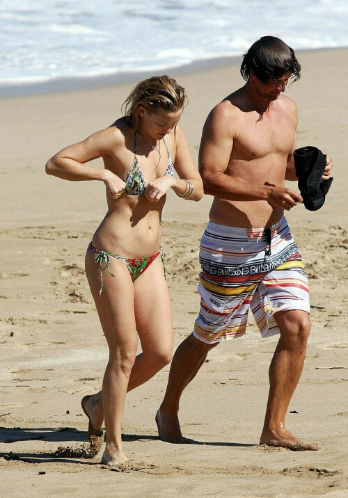 Romance heats up for Kate Hudson and Australian golfer Adam Scott in Hawaii - 12.01.2009After a string of failed relationships, it seems Hollywood star Kate Hudson has bounced back with a hot new romance.

The Bride Wars star was spotted frolicking on the beach with Australian PGA star Adam Scott in Hawaii yesterday.

Dressed in a tiny string bikini, Kate - who famously dated Owen Wilson and Lance Armstrong - spent the morning flirting up a storm with the 28-year-old while topping up her tan.

The pair first sparked whispers of a romance after they were spotted dining with a group friends at the Kapalua Resort last week.

However, Scott played down the rumours after the final round at the Mercedes-Benz Championship over the weekend.

He told reporters: 'I'm not here with her but I know Kate. We met here [for the first time]. We have a mutual friend so we met through him.'

The golfer is considered to be one of Australia's most eligible bachelors after splitting from long-term Swedish girlfriend Marie Kojzar last year.

Kate, 29, who has been described as a 'a hot ticket' on the dating scene by her close friend Stella McCartney, previously insisted she was steering clear of relationships.

'I'm actually enjoying being single right now because I really never have been,' she told InStyle magazine's January issue.

'I feel good in relationships. I enjoy them, so I feel my best when I'm in something solid. But it's also the first time I've ever taken a step back and gotten a new perspective.'

She said at the time: 'I've made a conscious decision to try to stay single as long as possible.'

Before jetting off to Hawaii, Kate was linked with New York Yankees baseball star Alex Rodriguez, who grew close to Madonna after her split from Guy Ritchie.

However, her spokesperson shot down reports the pair were dating.

Kate, the daughter of Goldie Hawn, has a five-year-old son Ryder with ex-husband Chris Robinson.

DailyMail

#KateHudson