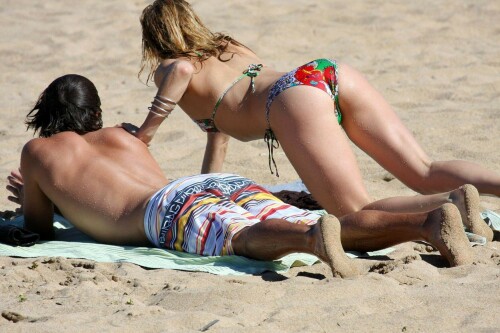 Romance heats up for Kate Hudson and Australian golfer Adam Scott in Hawaii - 12.01.2009After a string of failed relationships, it seems Hollywood star Kate Hudson has bounced back with a hot new romance.

The Bride Wars star was spotted frolicking on the beach with Australian PGA star Adam Scott in Hawaii yesterday.

Dressed in a tiny string bikini, Kate - who famously dated Owen Wilson and Lance Armstrong - spent the morning flirting up a storm with the 28-year-old while topping up her tan.

The pair first sparked whispers of a romance after they were spotted dining with a group friends at the Kapalua Resort last week.

However, Scott played down the rumours after the final round at the Mercedes-Benz Championship over the weekend.

He told reporters: 'I'm not here with her but I know Kate. We met here [for the first time]. We have a mutual friend so we met through him.'

The golfer is considered to be one of Australia's most eligible bachelors after splitting from long-term Swedish girlfriend Marie Kojzar last year.

Kate, 29, who has been described as a 'a hot ticket' on the dating scene by her close friend Stella McCartney, previously insisted she was steering clear of relationships.

'I'm actually enjoying being single right now because I really never have been,' she told InStyle magazine's January issue.

'I feel good in relationships. I enjoy them, so I feel my best when I'm in something solid. But it's also the first time I've ever taken a step back and gotten a new perspective.'

She said at the time: 'I've made a conscious decision to try to stay single as long as possible.'

Before jetting off to Hawaii, Kate was linked with New York Yankees baseball star Alex Rodriguez, who grew close to Madonna after her split from Guy Ritchie.

However, her spokesperson shot down reports the pair were dating.

Kate, the daughter of Goldie Hawn, has a five-year-old son Ryder with ex-husband Chris Robinson.

DailyMail

#KateHudson