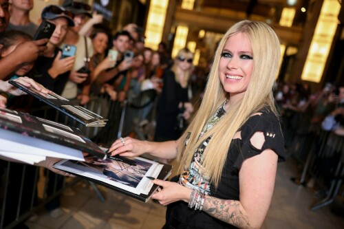 Avril Lavigne | 2024 iHeartRadio Music Awards, Los Angeles - 01.04.2024

Avril Lavigne brings her signature punk-rock style to iHeartRadio Awards in a shredded Green Day T-shirt

Avril Lavigne arrived at the 2024 iHeartRadio Awards in an all-black outfit.

For Monday's awards show, held in Los Angeles, the 39-year-old music sensation styled a shredded black Green Day T-shirt with parachute pants.

The Canadian pop star added height to her petite frame with lace-up boots that had a chunky heel.

Lavigne, who rose to fame at age 17, hit the red carpet with heavy eye makeup as she layered rings of black liner.

Her long, bright blonde locks were styled in a deep center part and ironed straight as they flowed over her chest.

Avril flaunted a lengthy, matte black manicure and flashed her tattooed arms as she posed for photos.

She layered glinty silver-toned chains around her neck, including a smaller one with a locket.

The hitmaker also stacked multiple bracelets on her left wrist as she flashed her megawatt smile.

Missing from the scene was her new boyfriend Nate Smith, who she was first spotted with earlier this year.

Cher is set to receive an Icon Award at the ceremony, which is being held at the Dolby Theatre in Hollywood.

iHeart is 'honoring her unparalleled contributions to music and pop culture for over seven decades,' per a press release.

Cher, who had hits dating back to the 1960s with I Got You Babe and was on the popular The Sonny & Cher Comedy Hour in the 1970s, is the only artist to have a number one single on a Billboard chart for seven consecutive decades.

Justin Timberlake and Jelly Roll are among the performers hitting the stage for the show.

Green Day, TLC, Lainey Wilson and Tate McRae will also sing at the star-studded event, which airs on Fox from 8 to 10 p.m. ET.

The nominations were announced in mid January.

Taylor Swift, Jelly Roll, 21 Savage, SZA and Olivia Rodrigo lead with most nominations.

Airing LIVE on FOX, the event also will be heard on iHeartRadio stations nationwide and on the iHeartRadio app.

Artists receiving multiple nominations include, 21 Savage, Beyoncé, Billie Eilish, Blink-182, Carin León, David Kushner, Doechii, Doja Cat, Drake, Dua Lipa, Fall Out Boy, Foo Fighters, Grupo Frontera, Ice Spice, Jelly Roll.

DailyMail

#AvrilLavigne